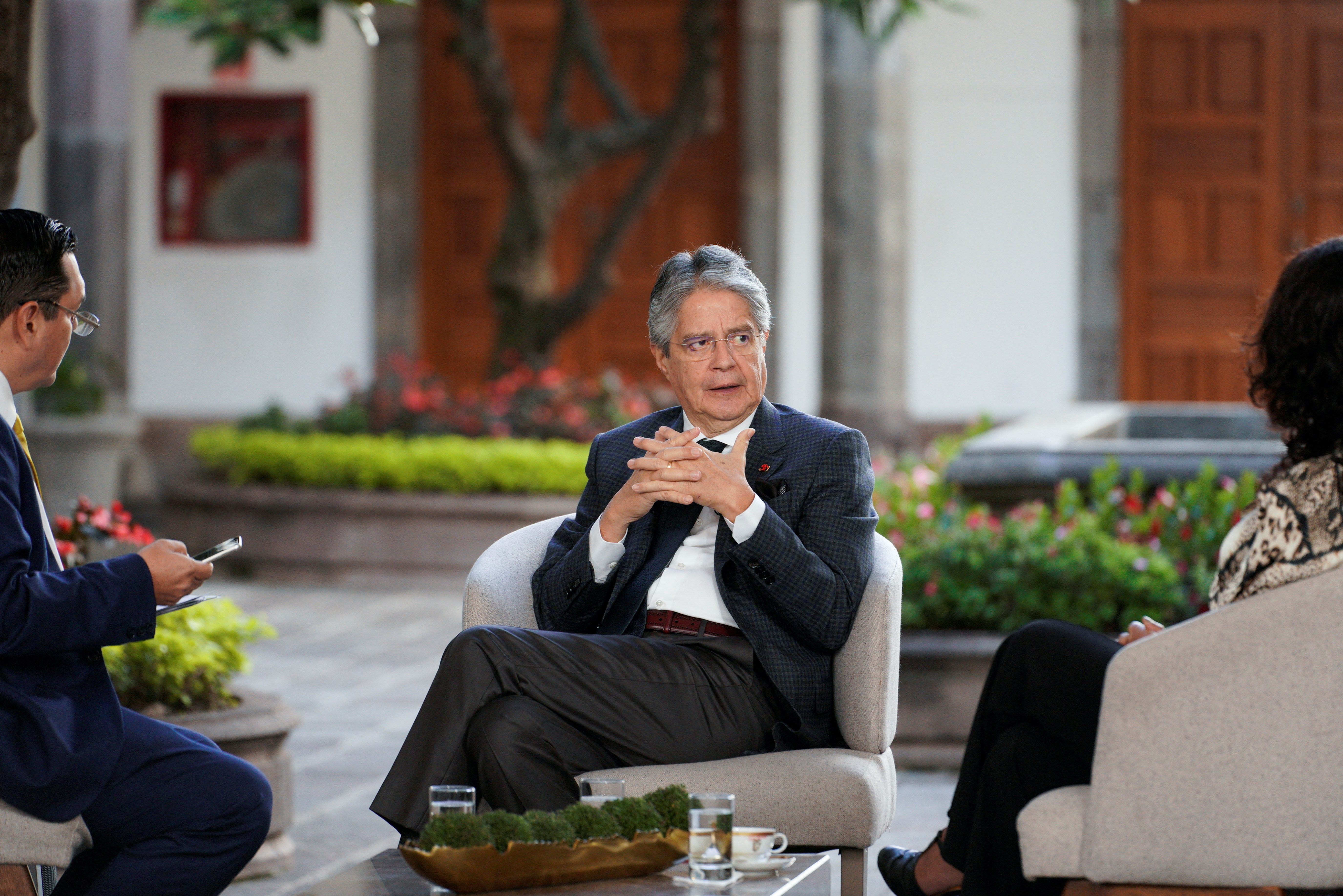 Ecuadorean President Guillermo Lasso sits for an interview, in Quito