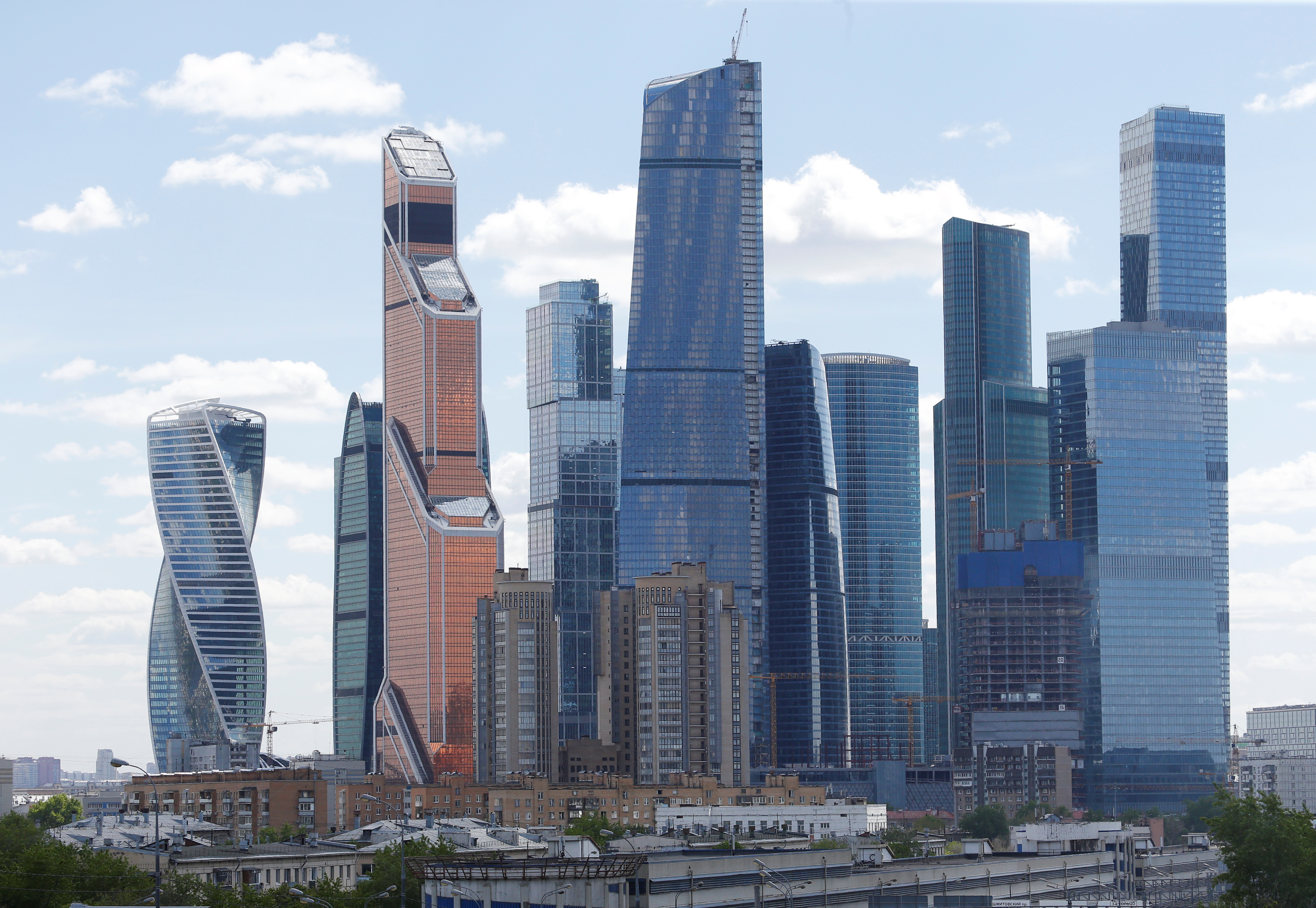 A general view shows residential buildings in front of the Moscow International Business Center, also known as "Moskva-City", in Moscow