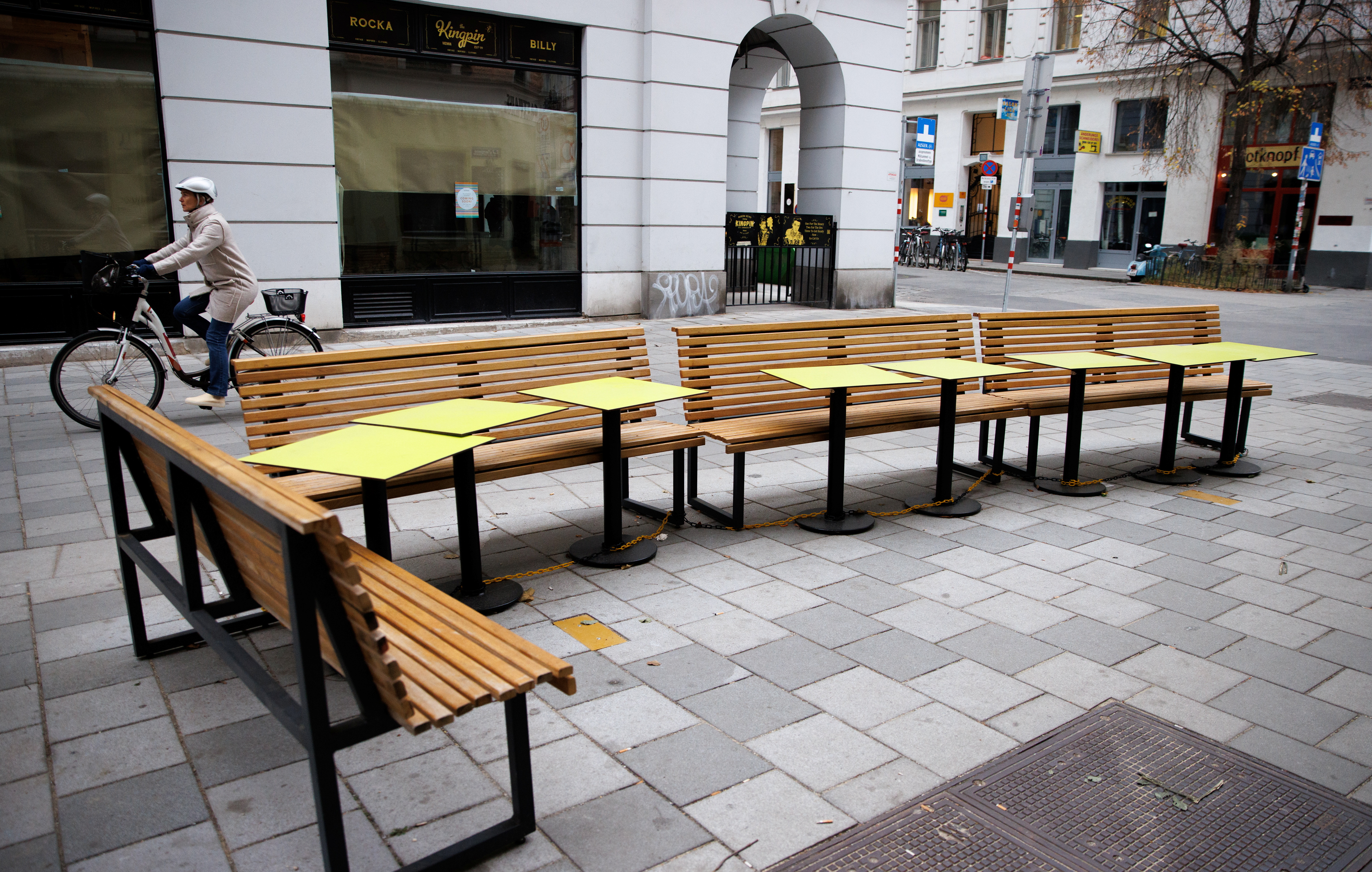 Abandoned tables of a closed restaurant are seen in a street as the Austrian government imposed fourth national coronavirus disease (COVID-19) lockdown in Vienna, Austria, November 22, 2021. REUTERS/Lisi Niesner