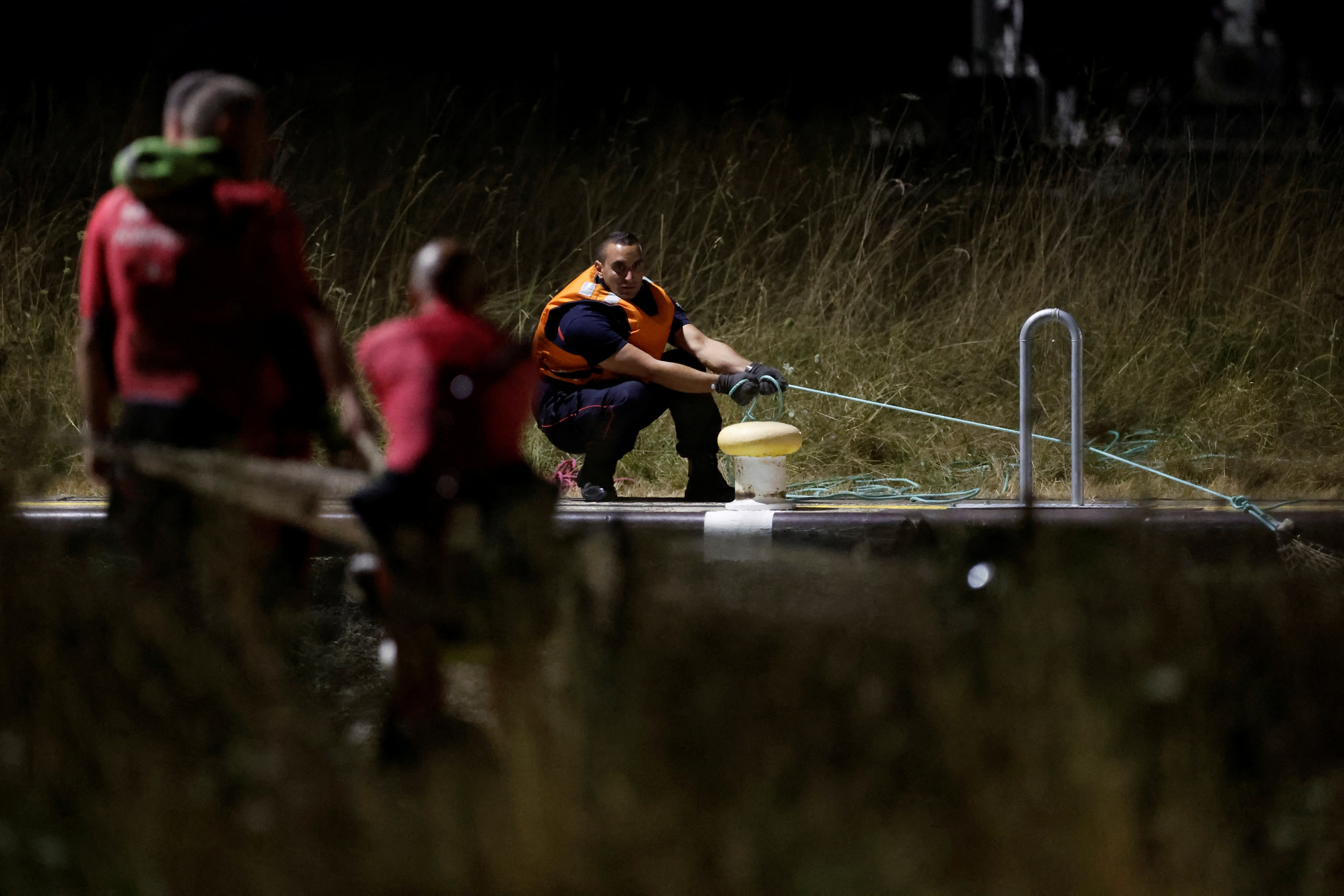 Trapped beluga whale lifted out of Seine hours before death