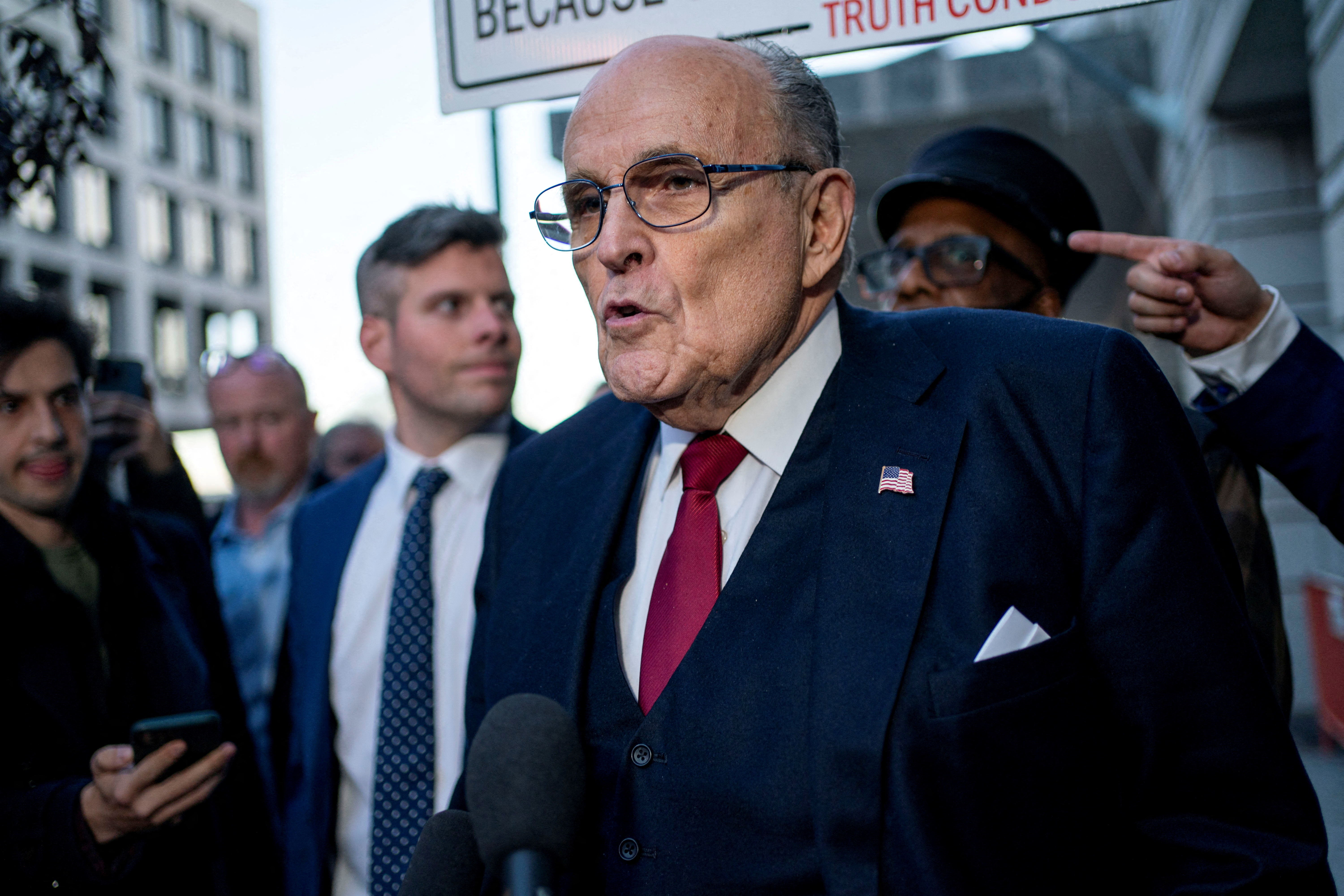 Former New York Mayor Rudy Giuliani departs defamation lawsuit at the District Courthouse in Washington