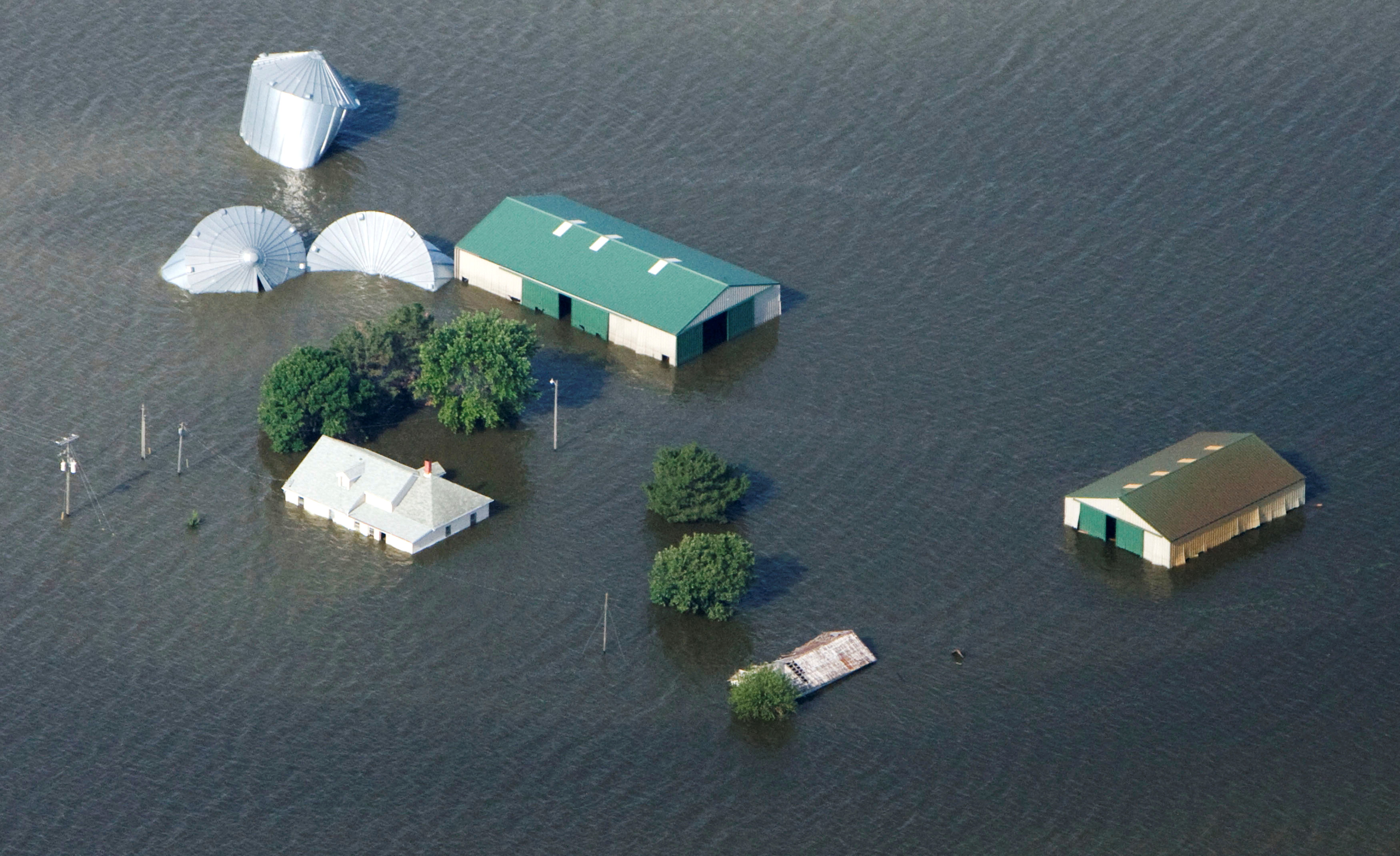 An aerial view of a farm north of Council Bluffs, Iowa, submerged in Missouri River flood waters