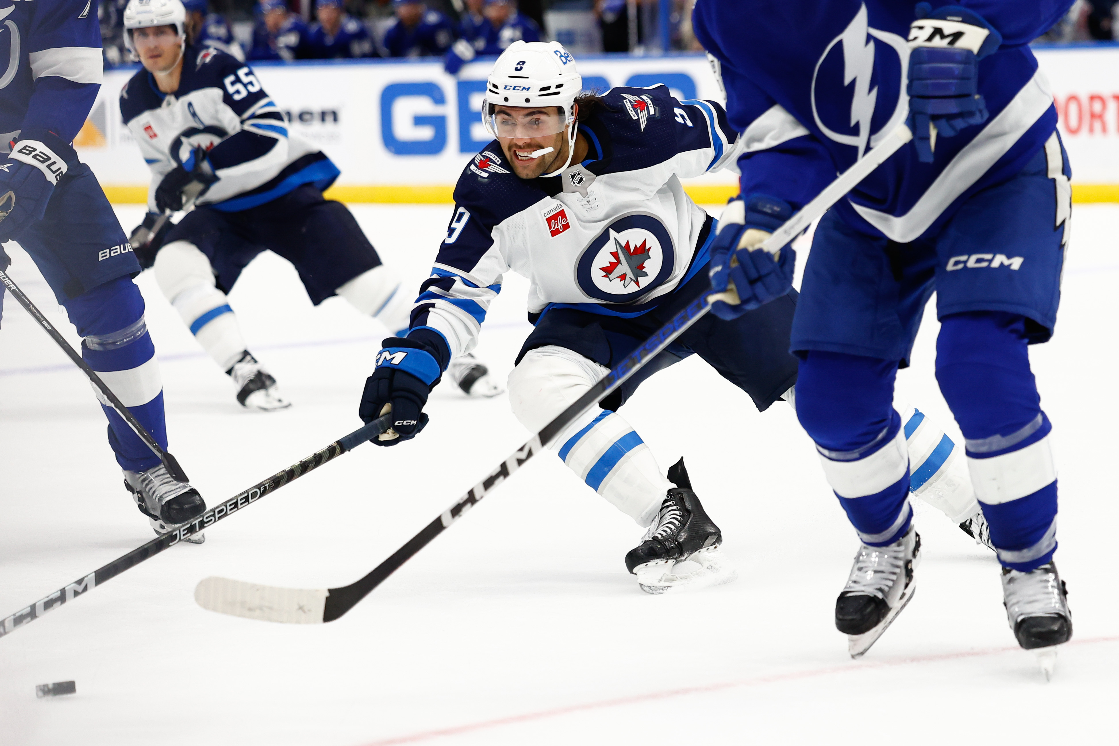 Adam Lowry leads Jets past Lightning in overtime | Reuters