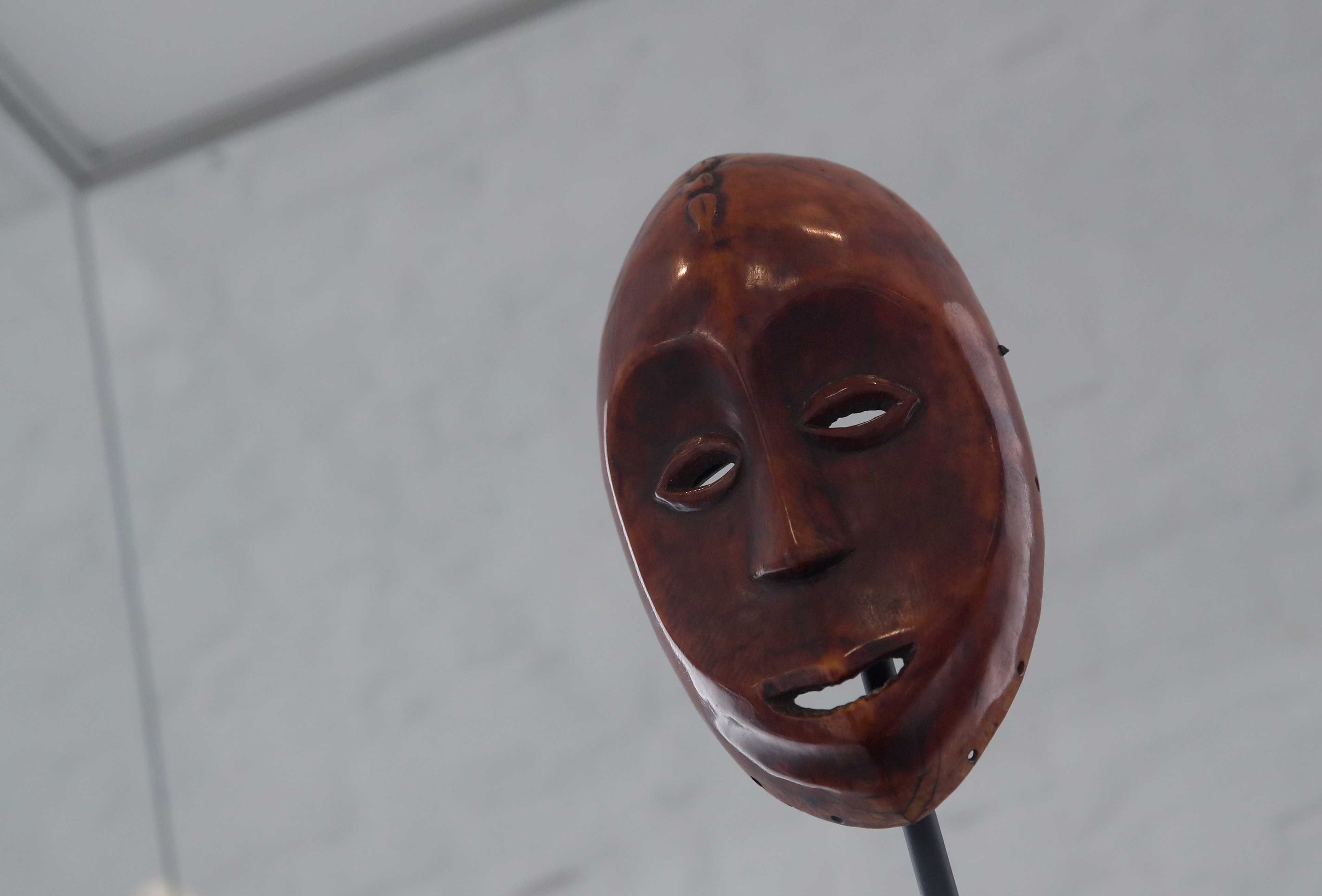 An ivory mask dated to the 19th century is pictured at the Royal Museum for Central Africa (RMCA) as the Belgian government has announced plans to return pieces of art looted from Congo during colonial rule, in Tervuren, Belgium July 6, 2021.  REUTERS/Yves Herman