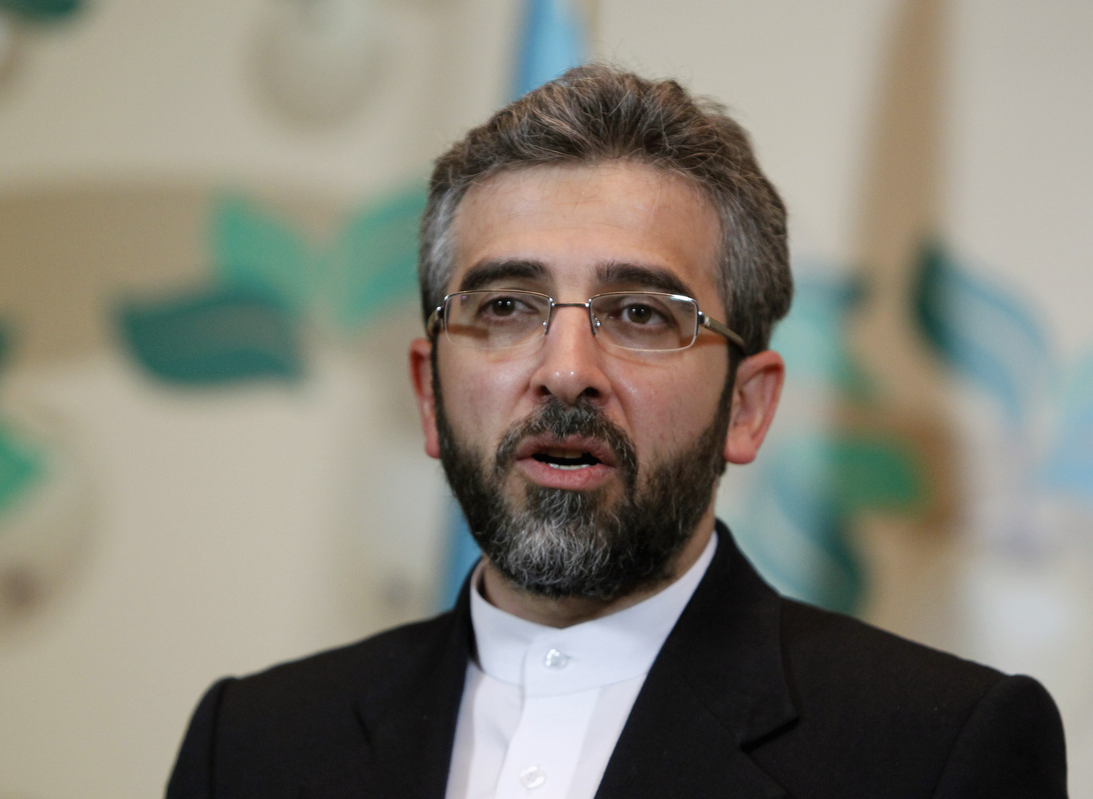 Iran's deputy negotiator Bagheri speaks during a news conference in Almaty