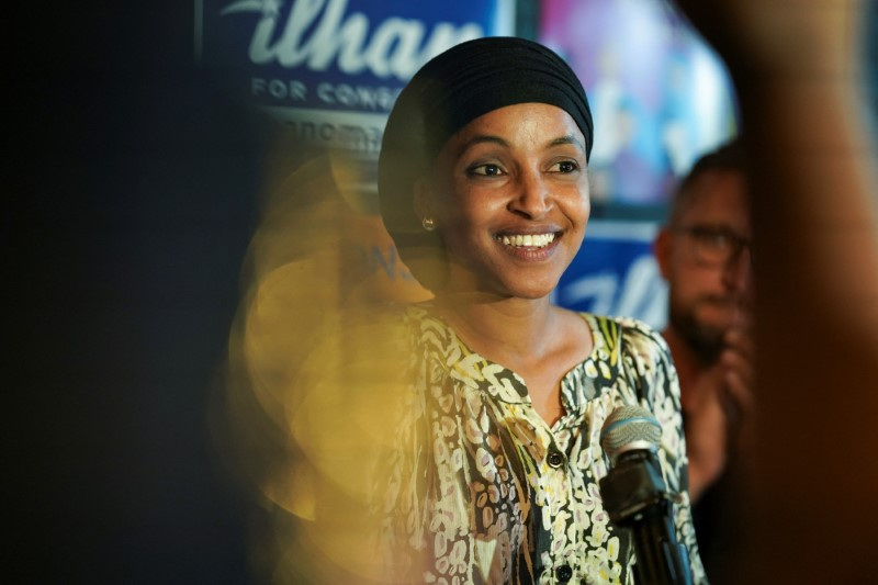 U.S. Democratic House Representative Ilhan Omar (D-MN) greets supporters during primary election day in Minneapolis