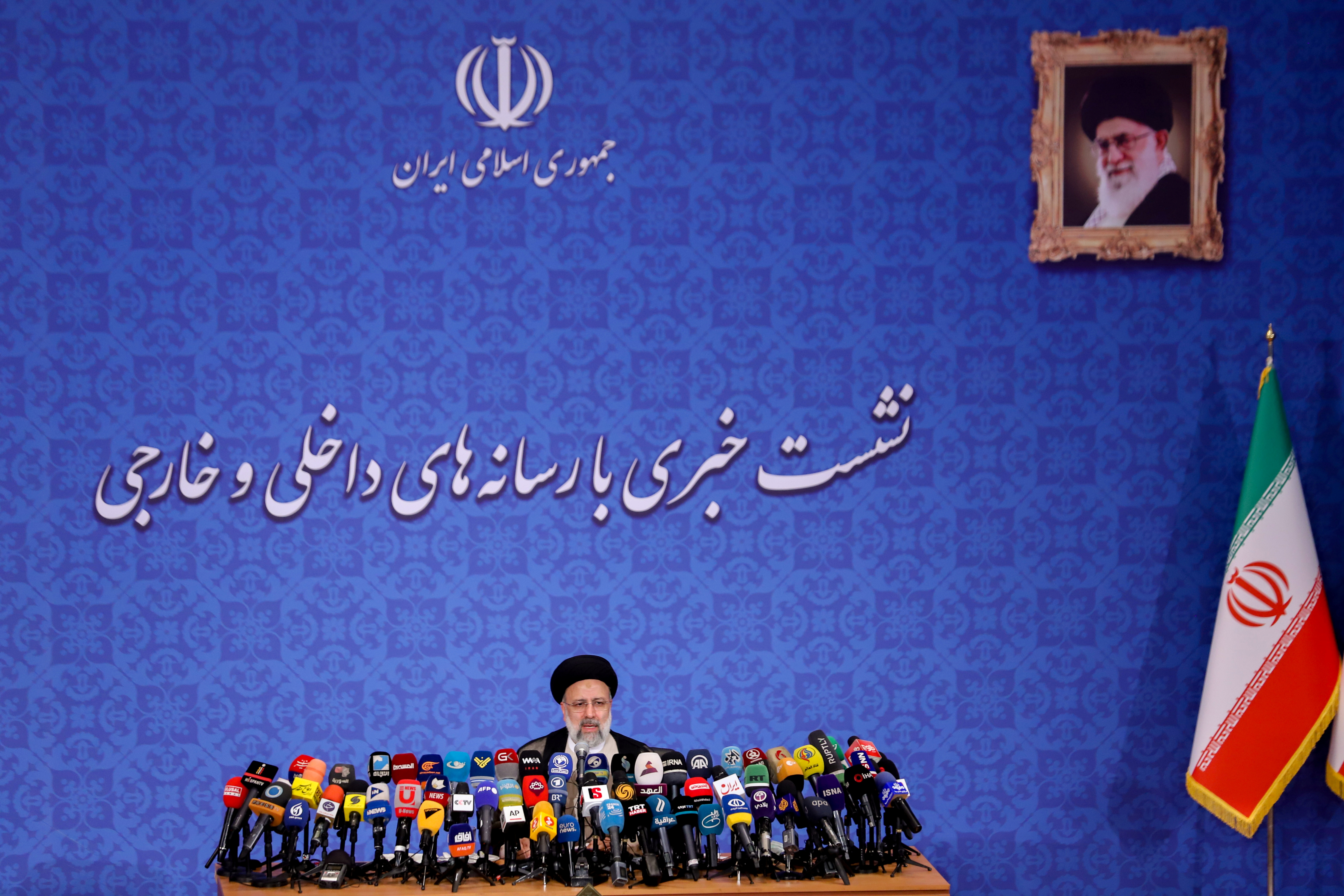 Iran's President-elect Ebrahim Raisi speaks during a news conference in Tehran
