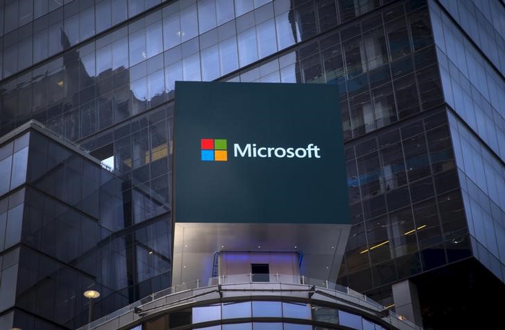 The Microsoft logo is seen on an electronic billboard on an office building in New York City