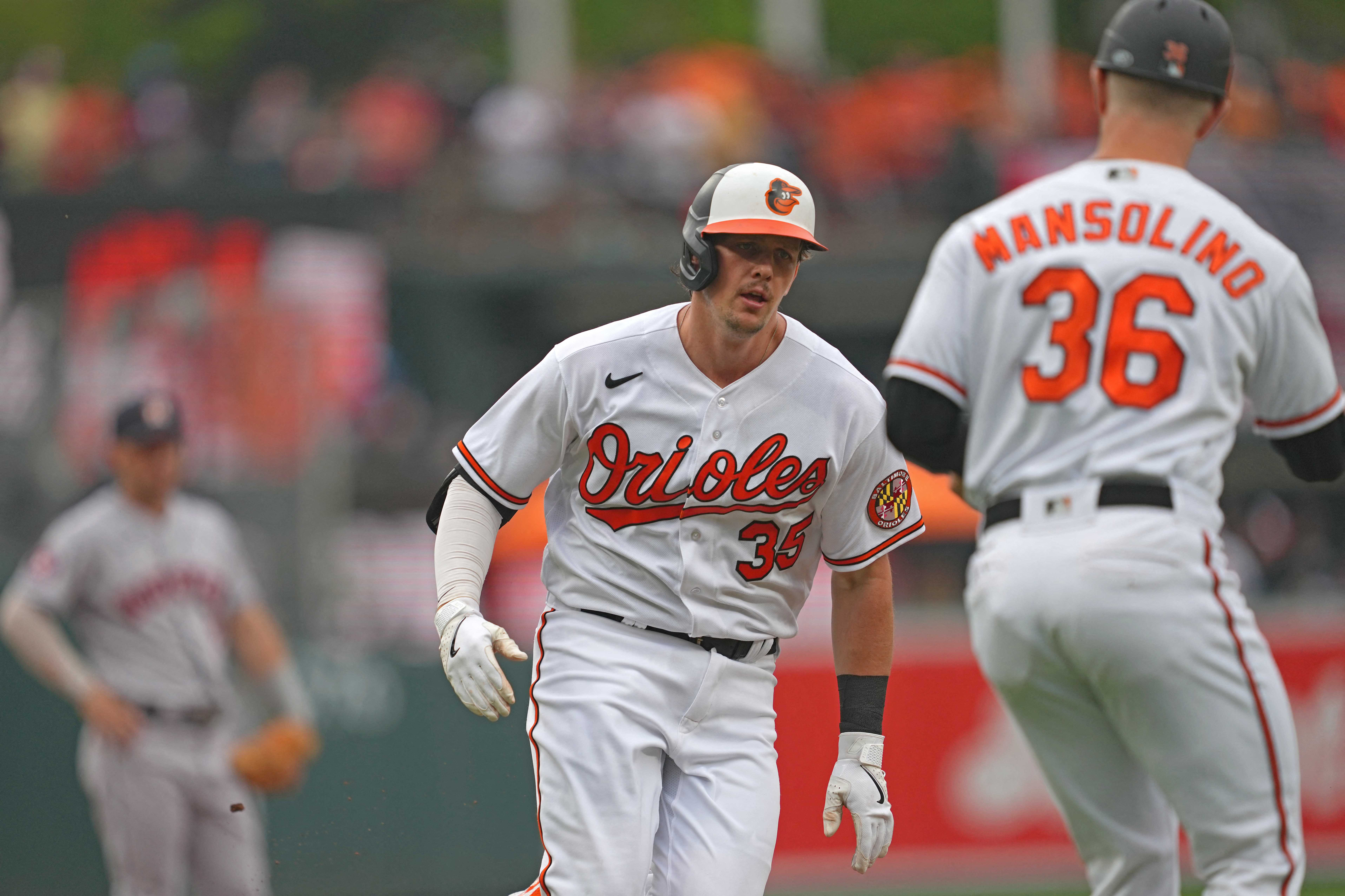 Baltimore Orioles pitcher Dean Kremer, right, is congratulated by catcher  Adley Rutschman after pitching a 6-0 shutout against the Houston Astros in  a baseball game, Friday, Sept. 23, 2022, in Baltimore. (AP