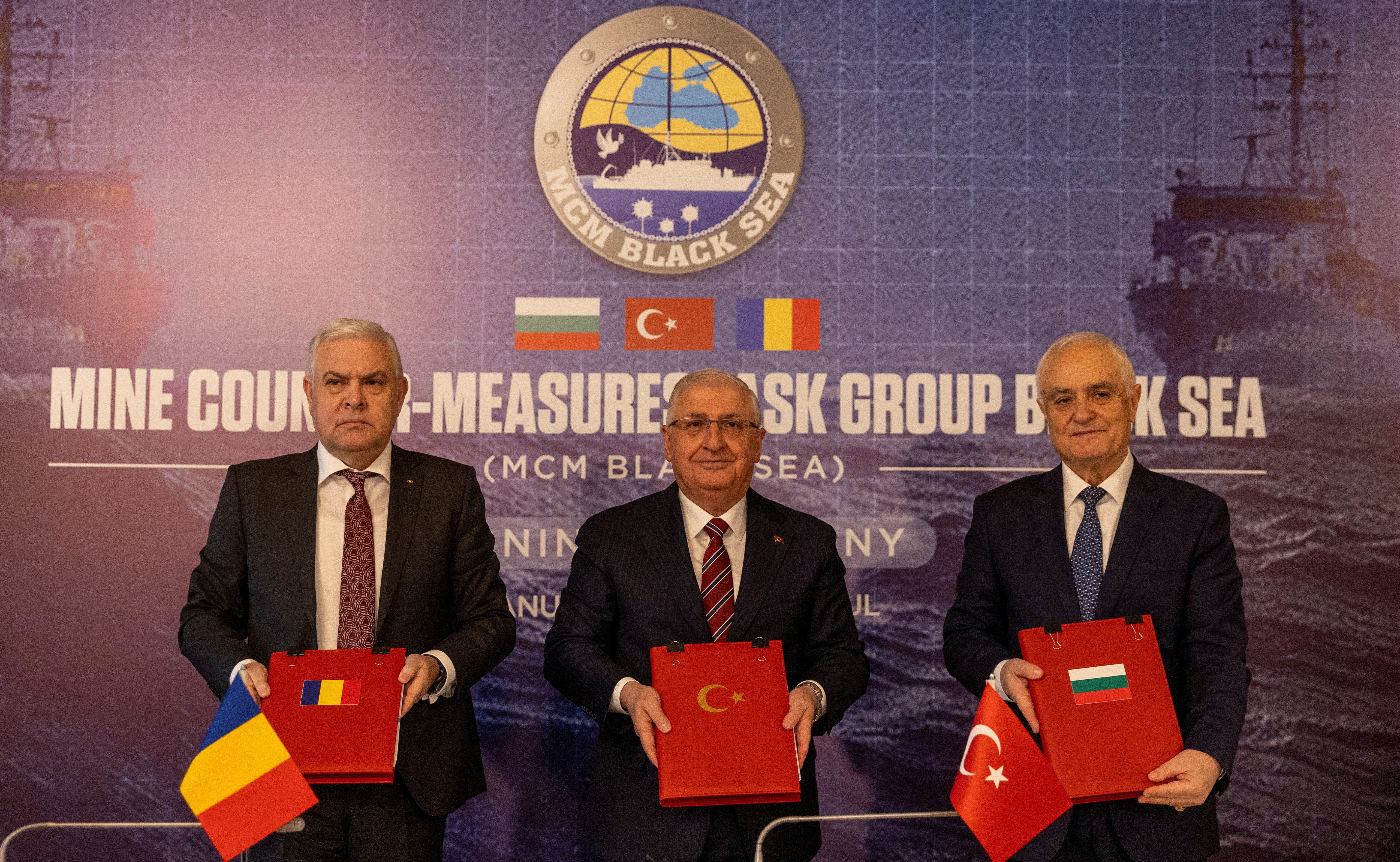 Turkish Defence Minister Yasar Guler, his Romanian counterpart Angel Tilvar and Bulgaria's Deputy Defence Minister Atanas Zapryanov attend a signing ceremony in Istanbul