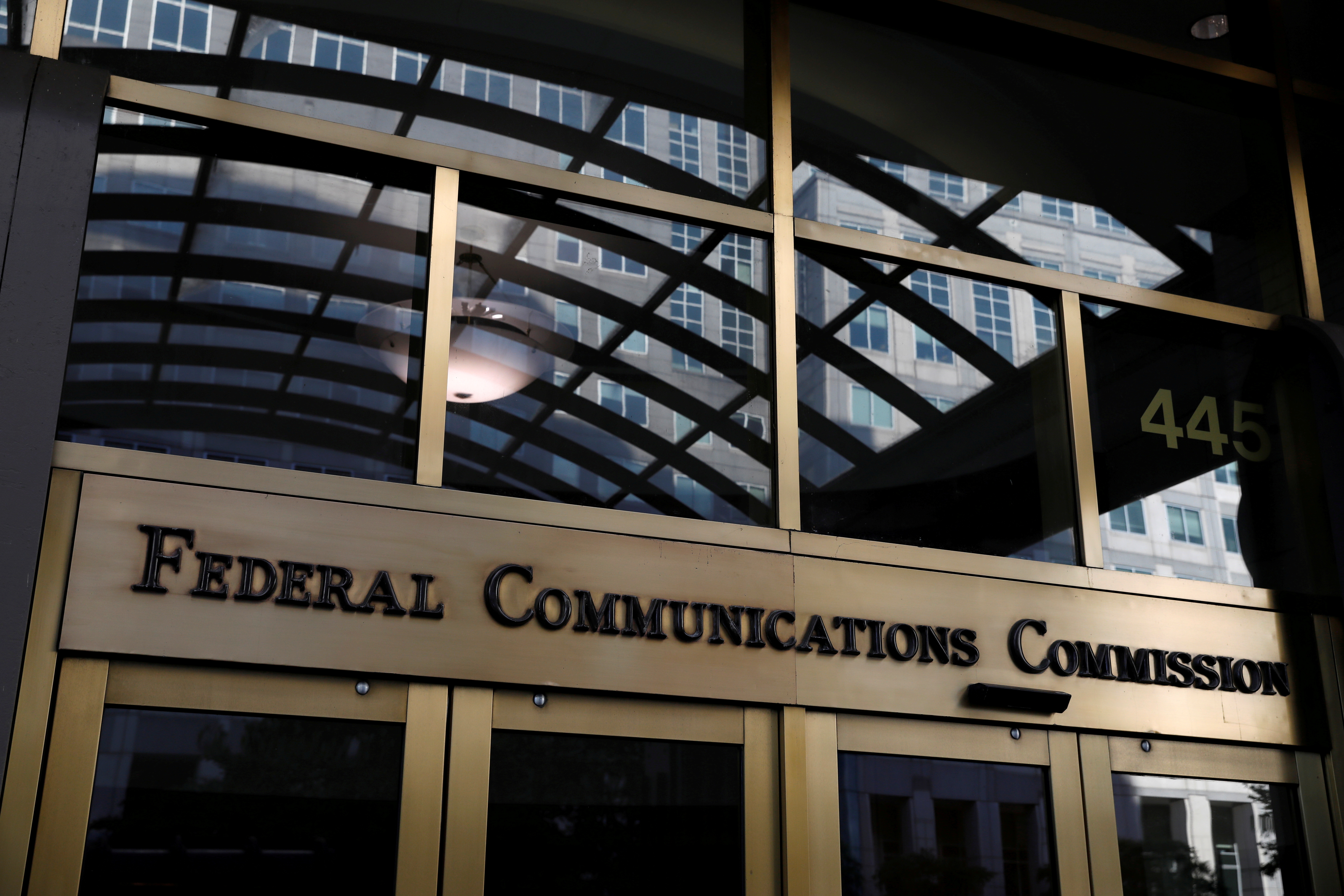 Signage is seen at the headquarters of the Federal Communications Commission in Washington, D.C.