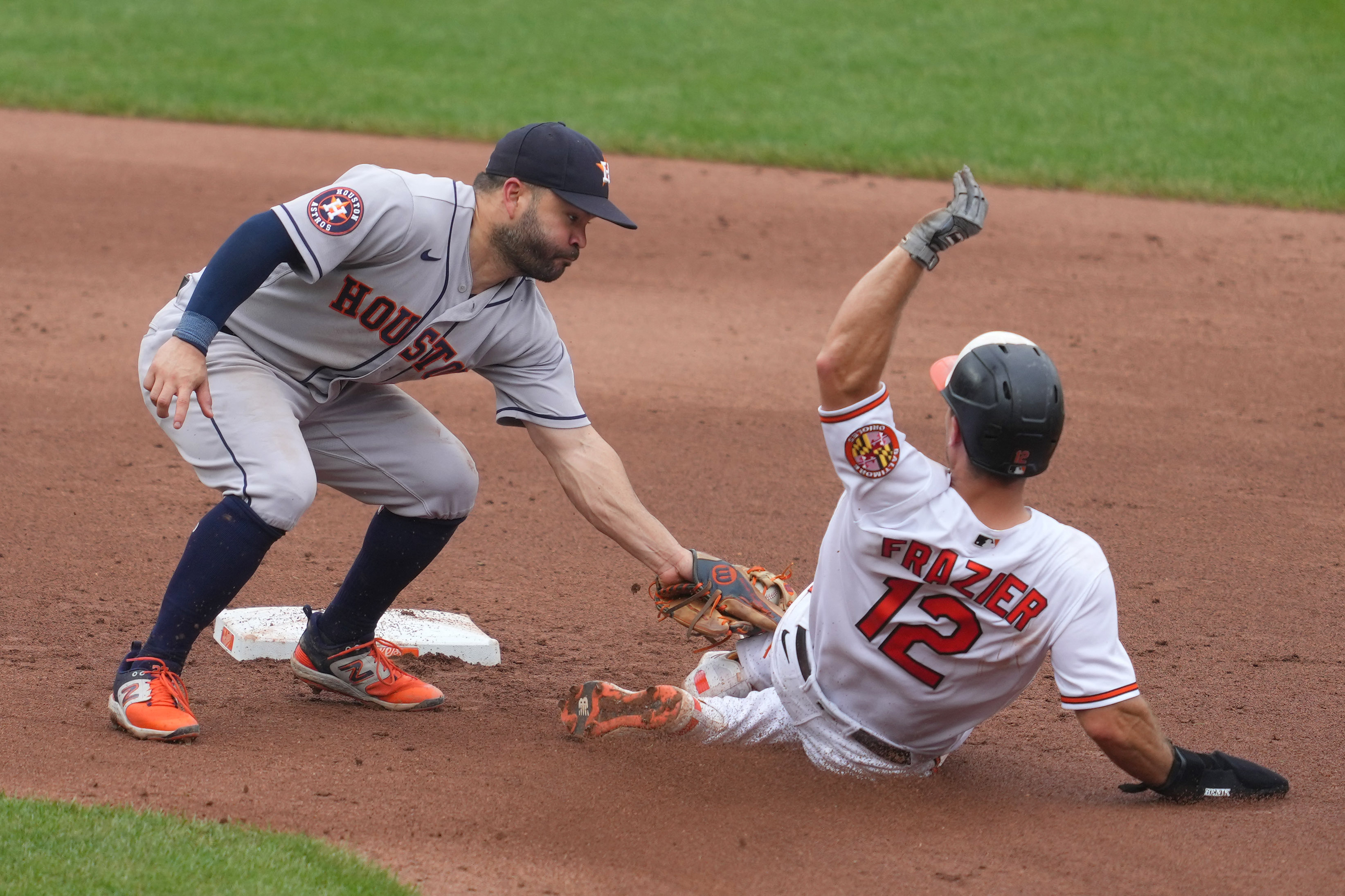 Baltimore Orioles pitcher Dean Kremer, right, is congratulated by catcher  Adley Rutschman after pitching a 6-0 shutout against the Houston Astros in  a baseball game, Friday, Sept. 23, 2022, in Baltimore. (AP