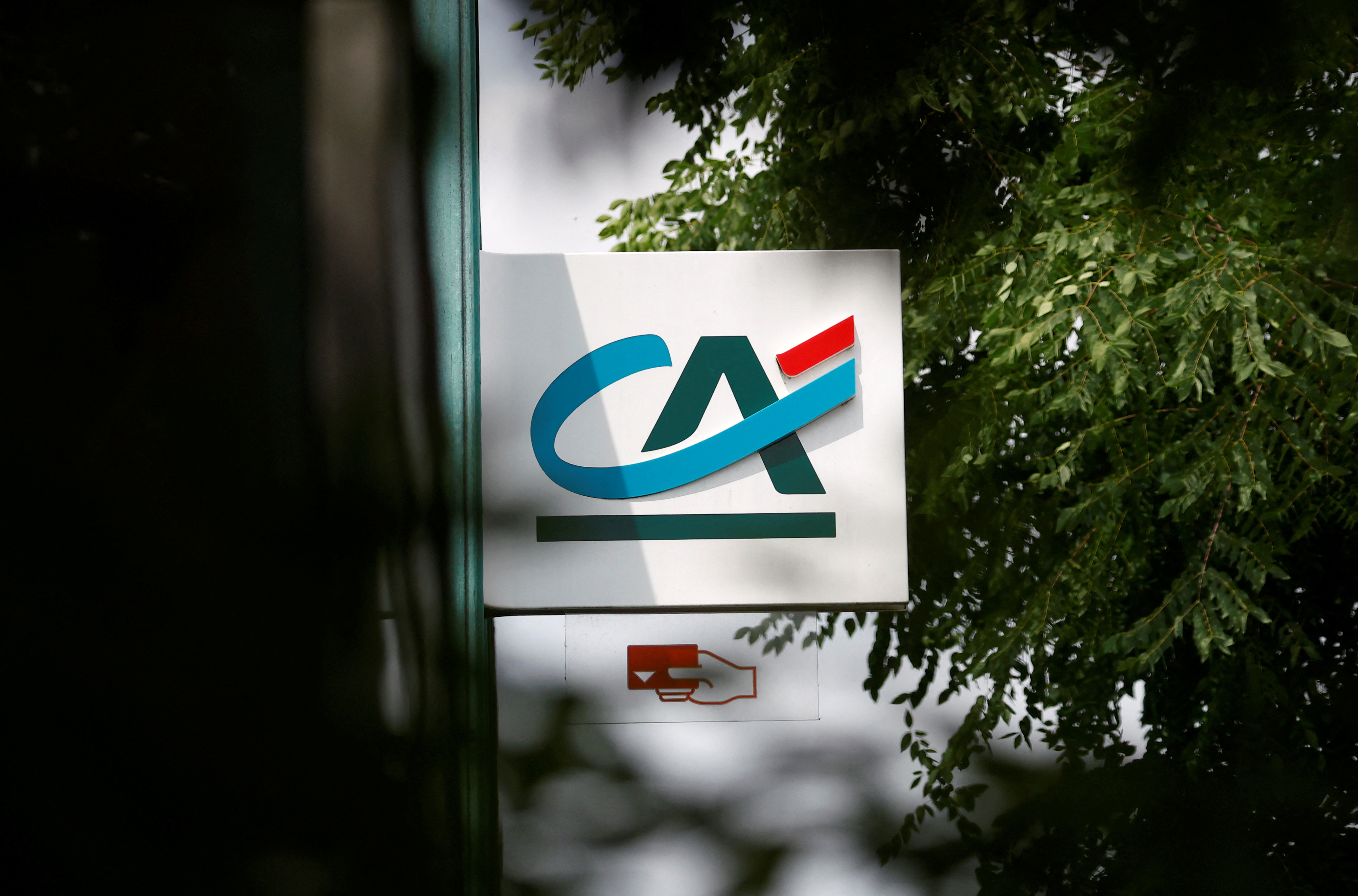 Logo of Credit Agricole outside a bank office in Reze