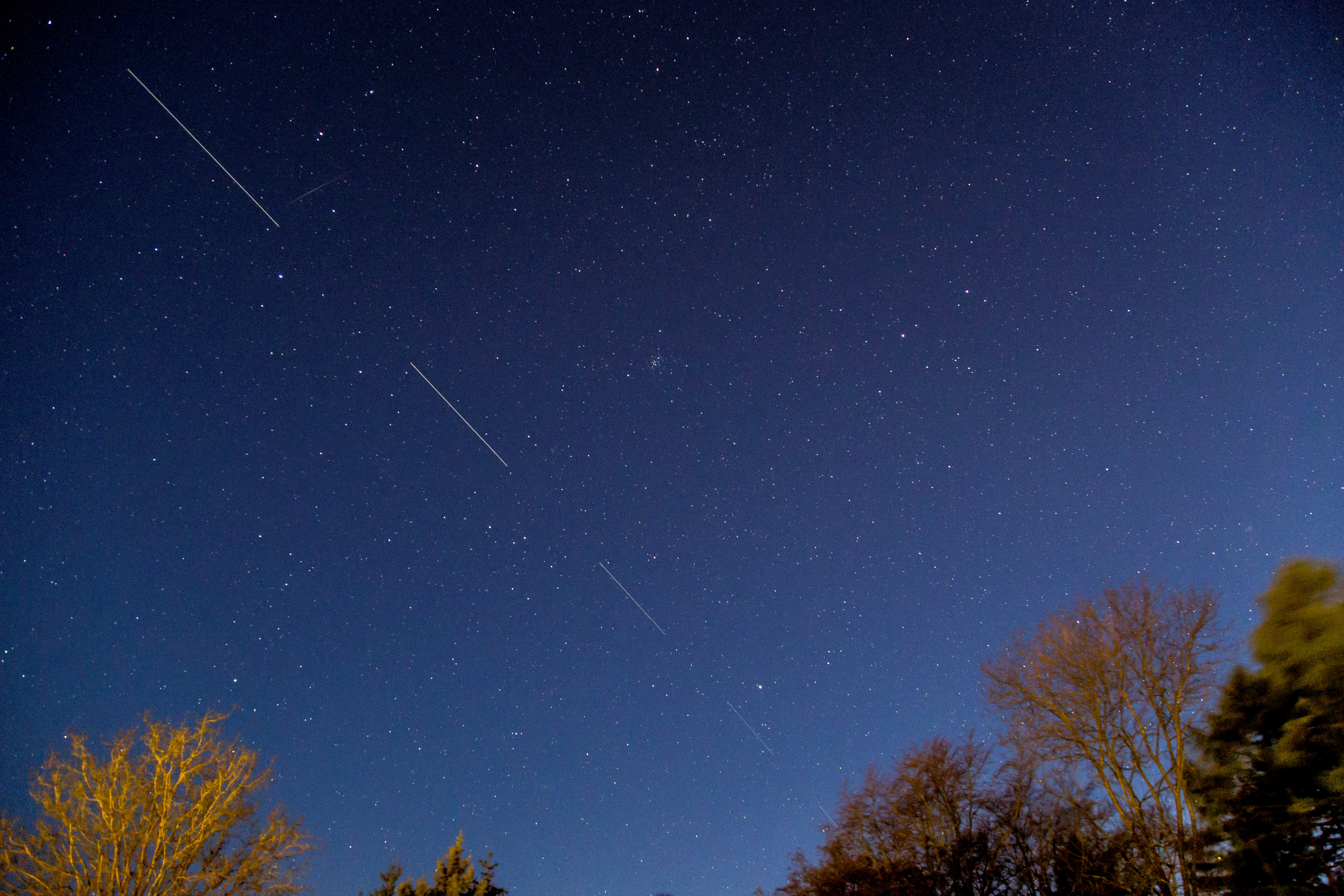 SpaceX Starlink 5 satellites are pictured in the sky seen from Svendborg