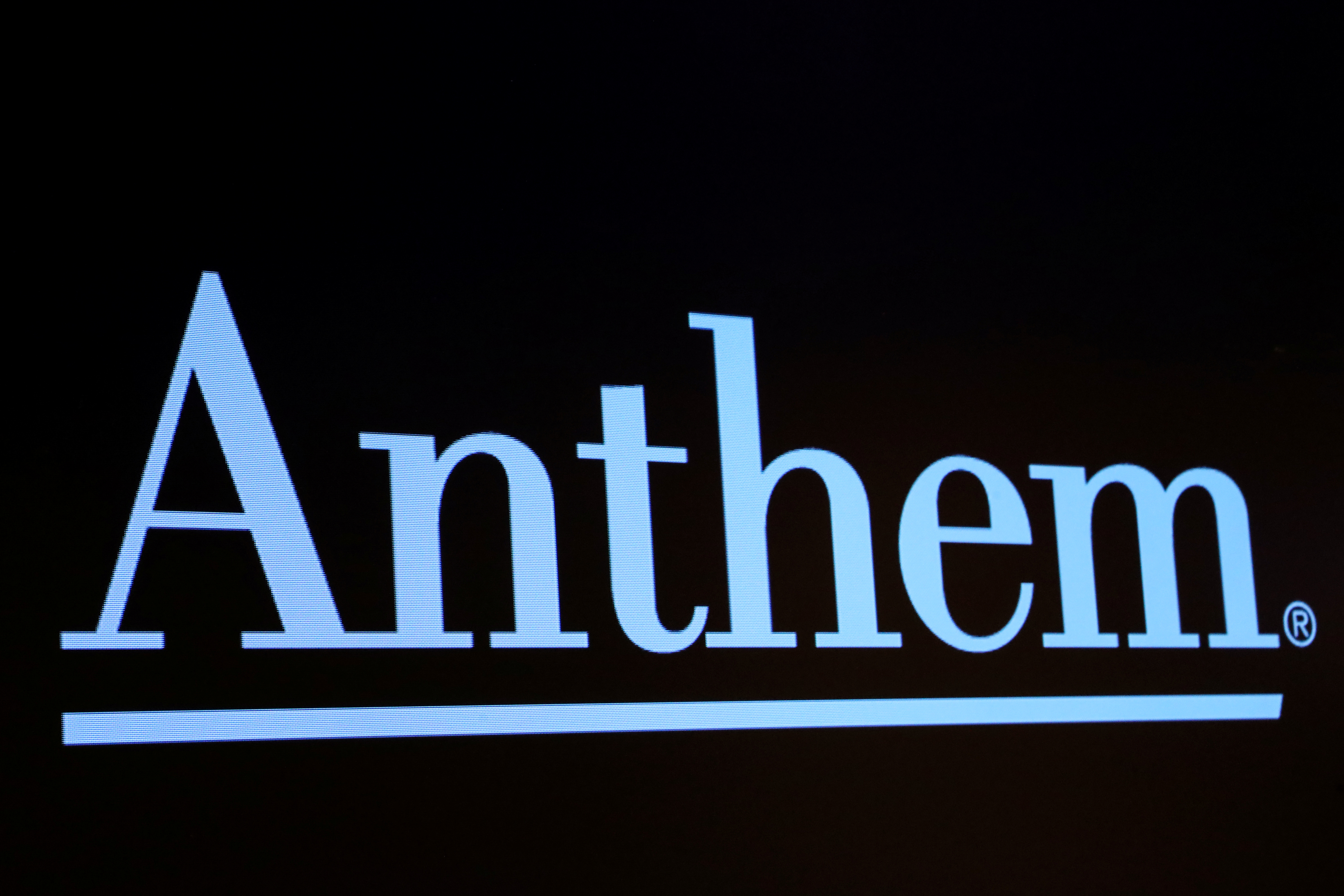 The logo for health insurance provider, Anthem, is displayed on a screen on the floor at the NYSE in New York