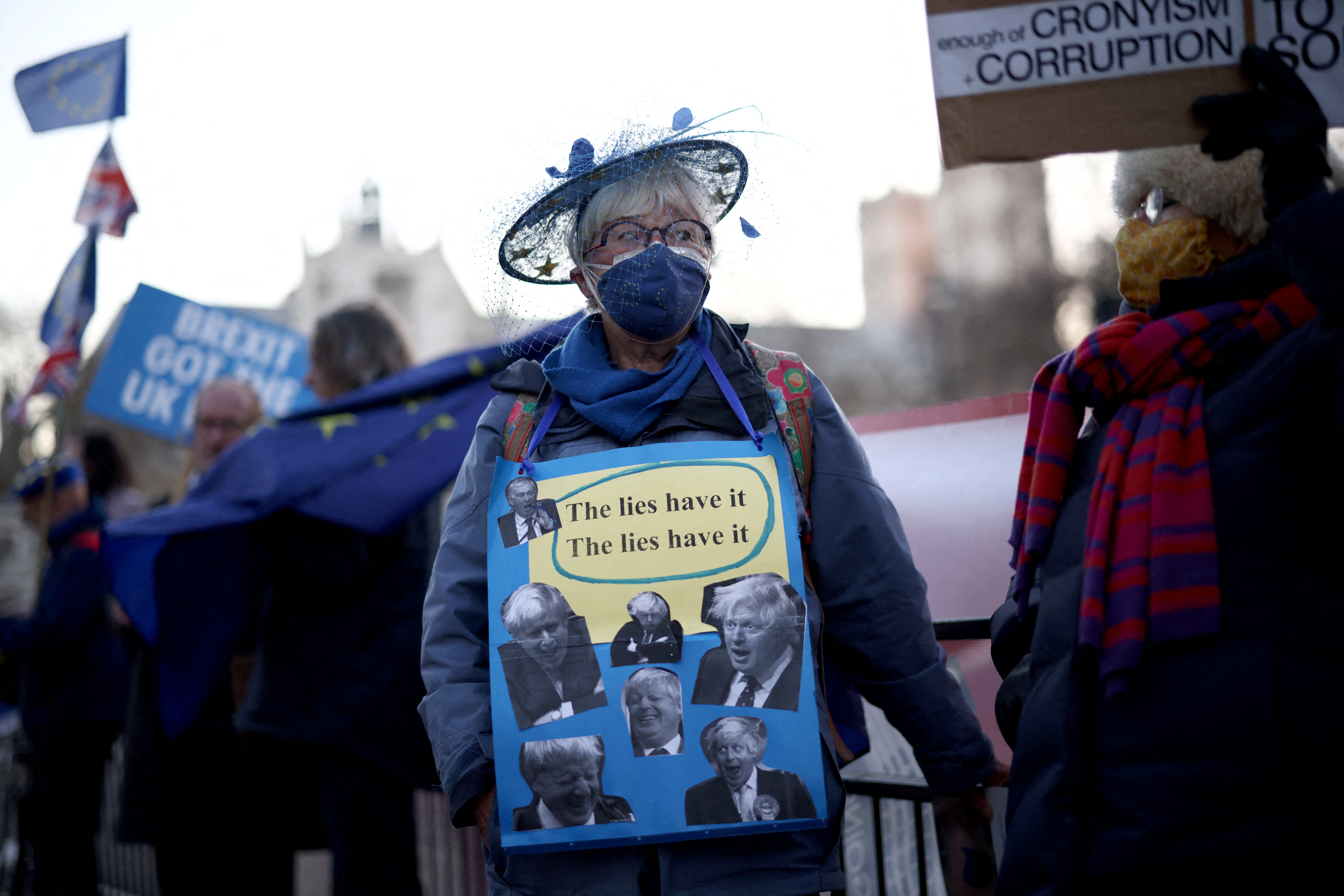 People gather in protest against the Conservative Party in London, Britain, January 12, 2022. REUTERS/Henry Nicholls