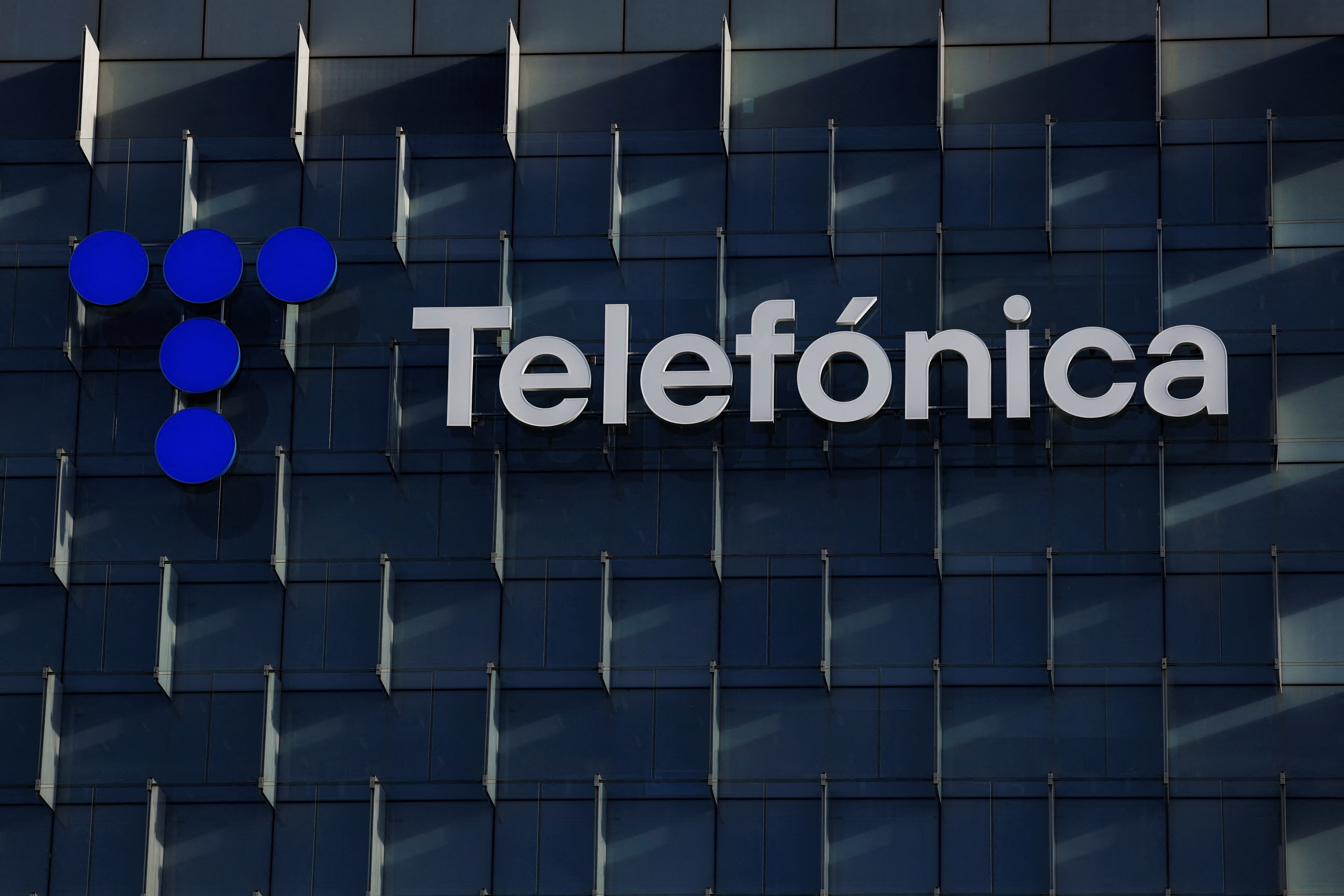 The logo of Spanish Telecom company Telefonica is displayed atop the company's headquarters in Madrid