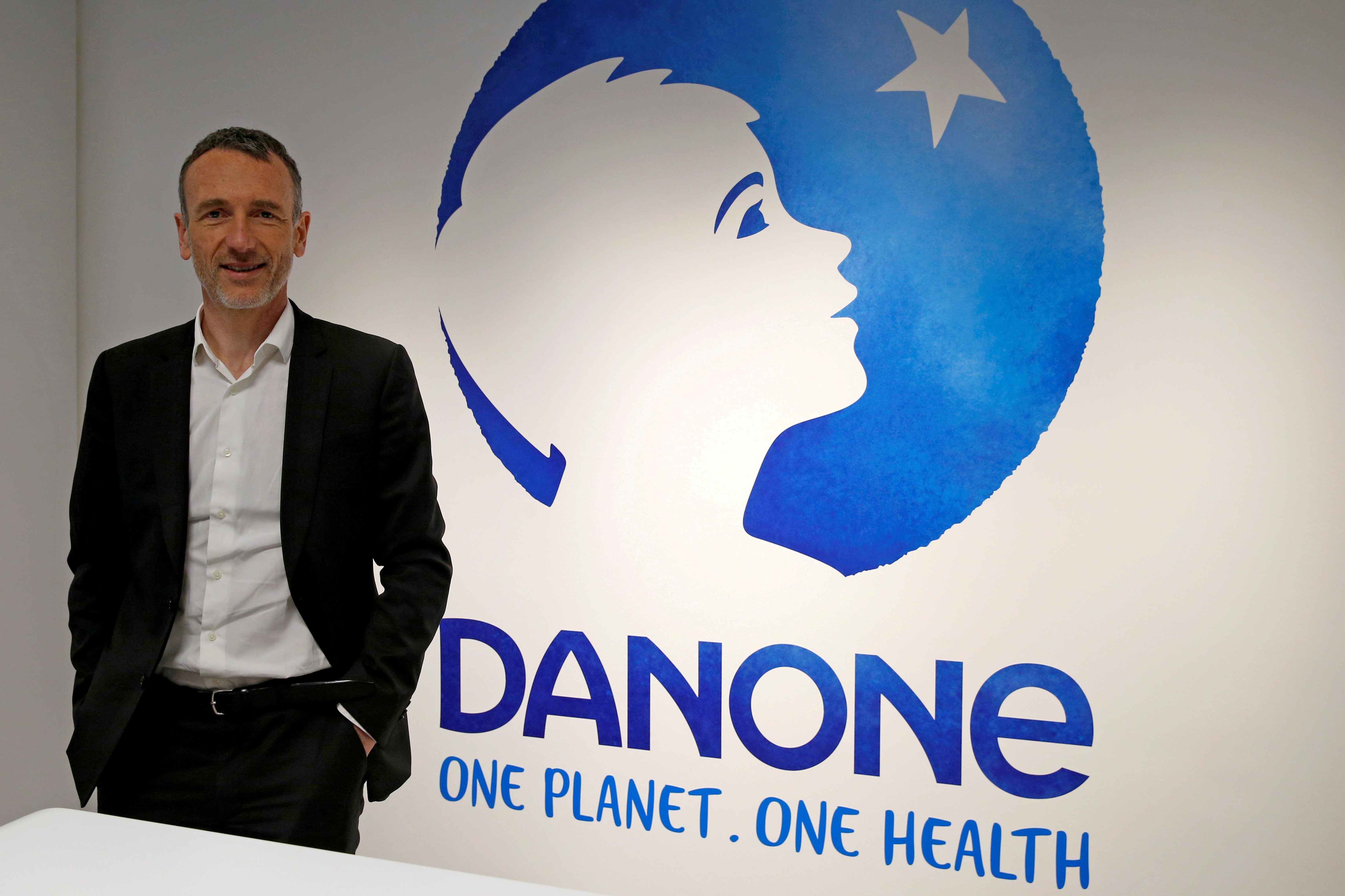 Danone's Faber before a news conference