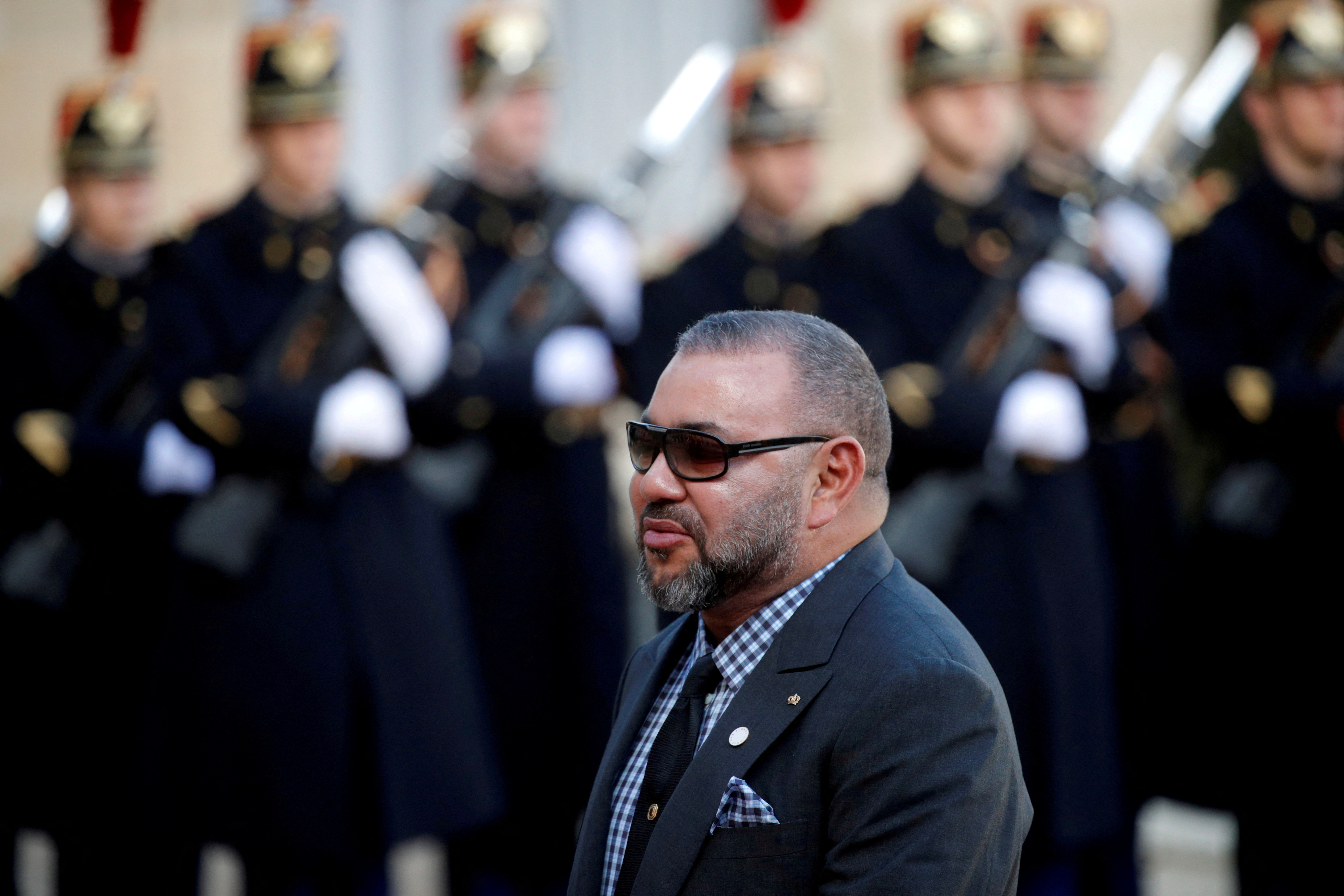 Morocco's King Mohammed VI arrives for a lunch at the Elysee Palace as part of the One Planet Summit in Paris