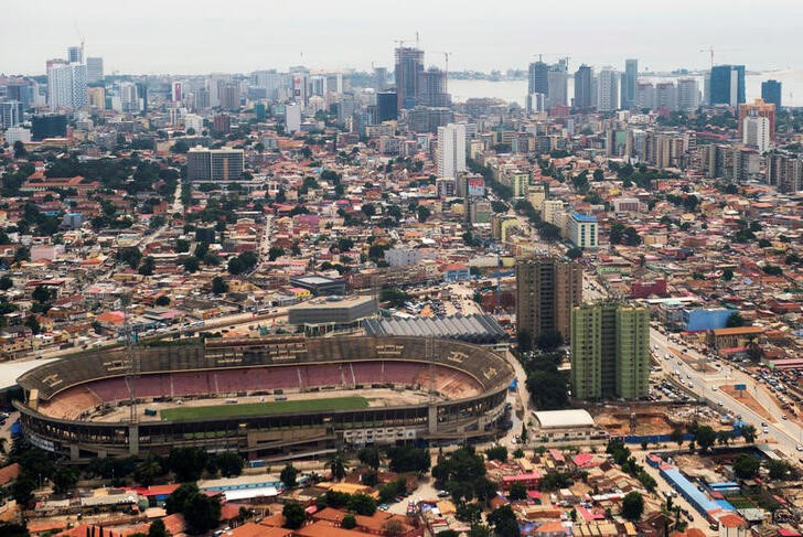 The Estadio da Cidadela stadium is seen with the skyline of central Luanda