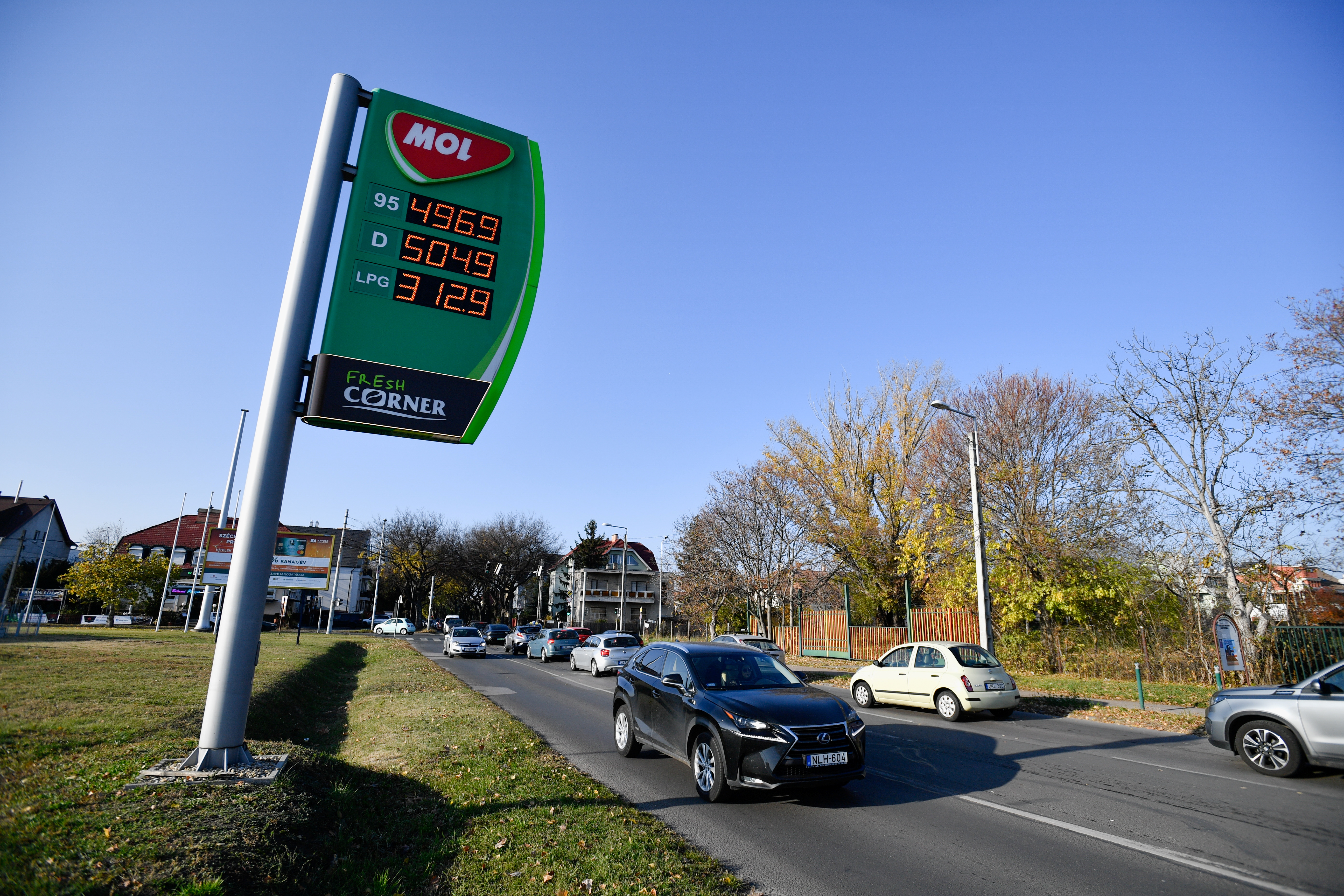 Cars pass by a gas station of Hungarian oil company MOL in Budapest
