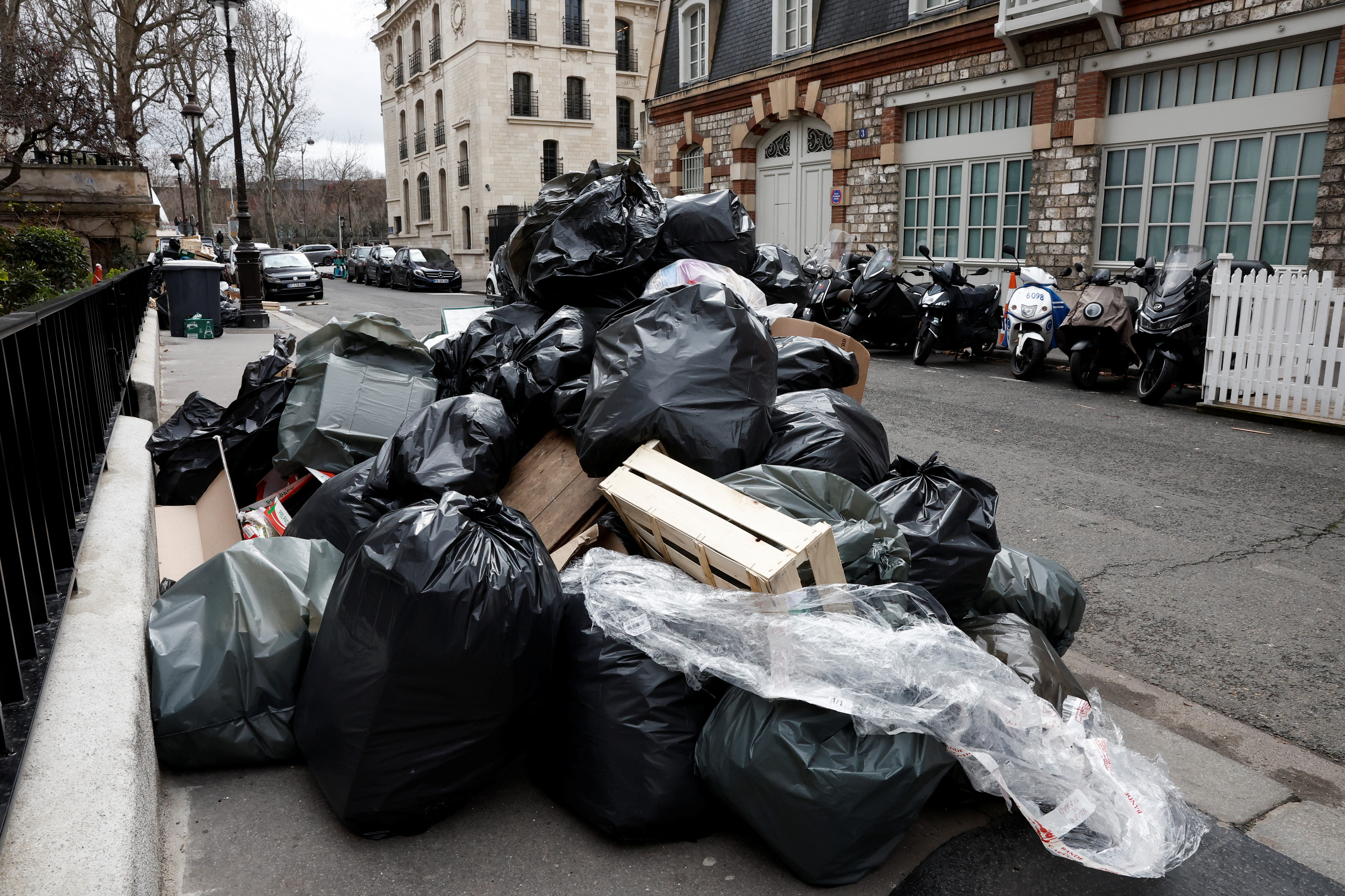 Garbage piles up as French strike nationwide over pension change