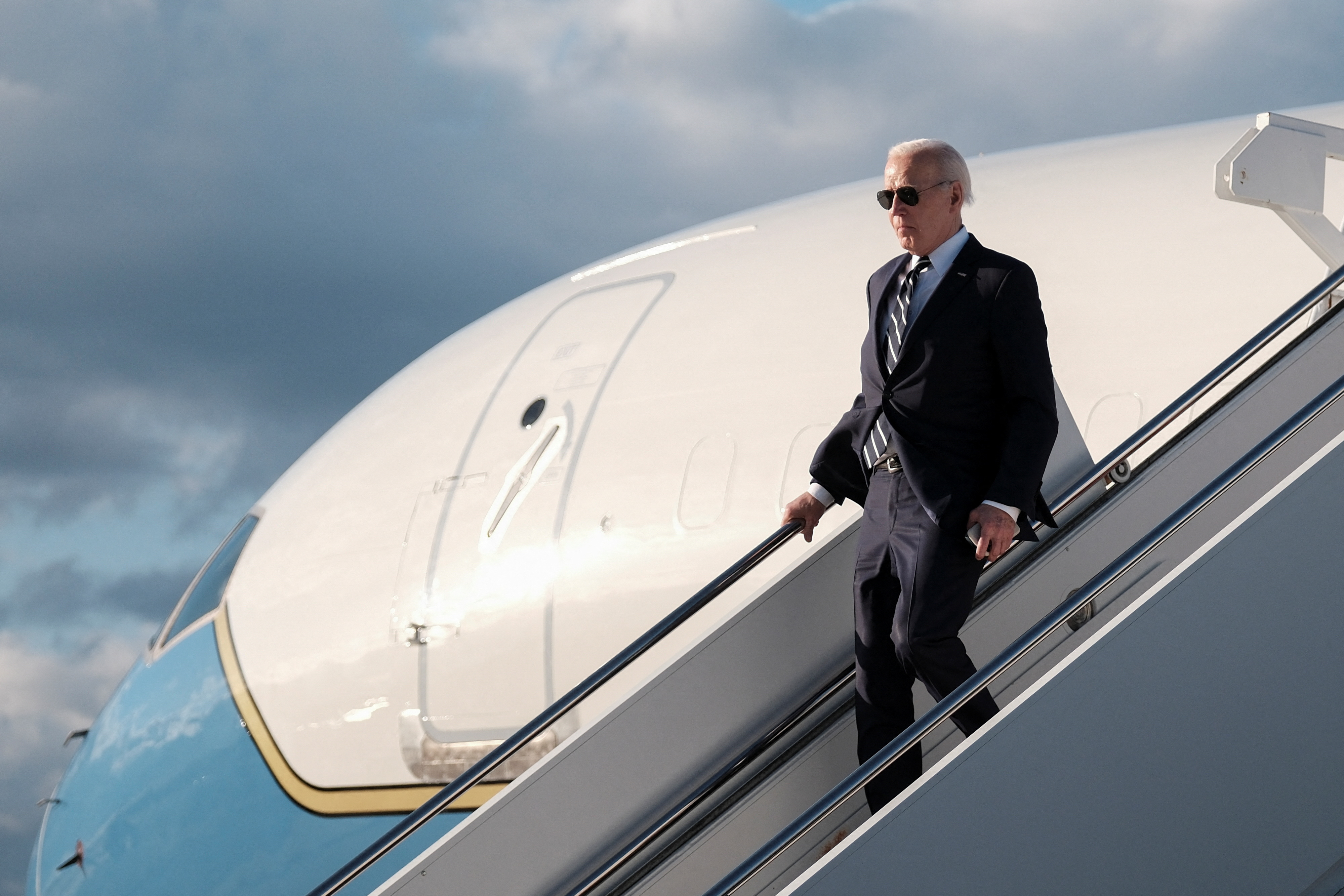 U.S. President Joe Biden disembarks from Air Force One at Dover Air Force Base, in Dover