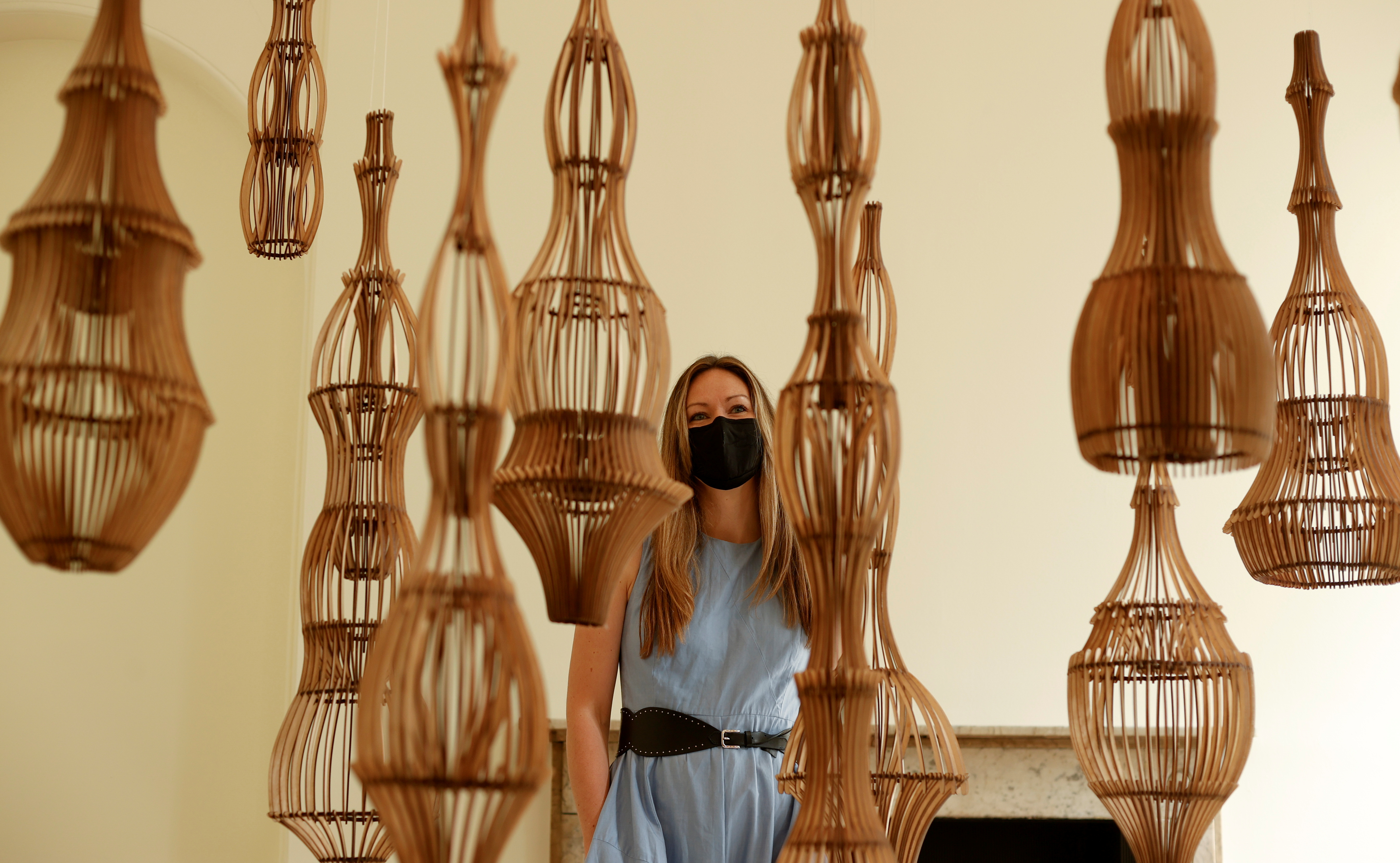 Artist Naomi McIntosh poses for a photograph with her creation 'Ruup & Form Quiet Garden' at the London Design Biennale at Somerset House in London, Britain, June 1, 2021. REUTERS/John Sibley