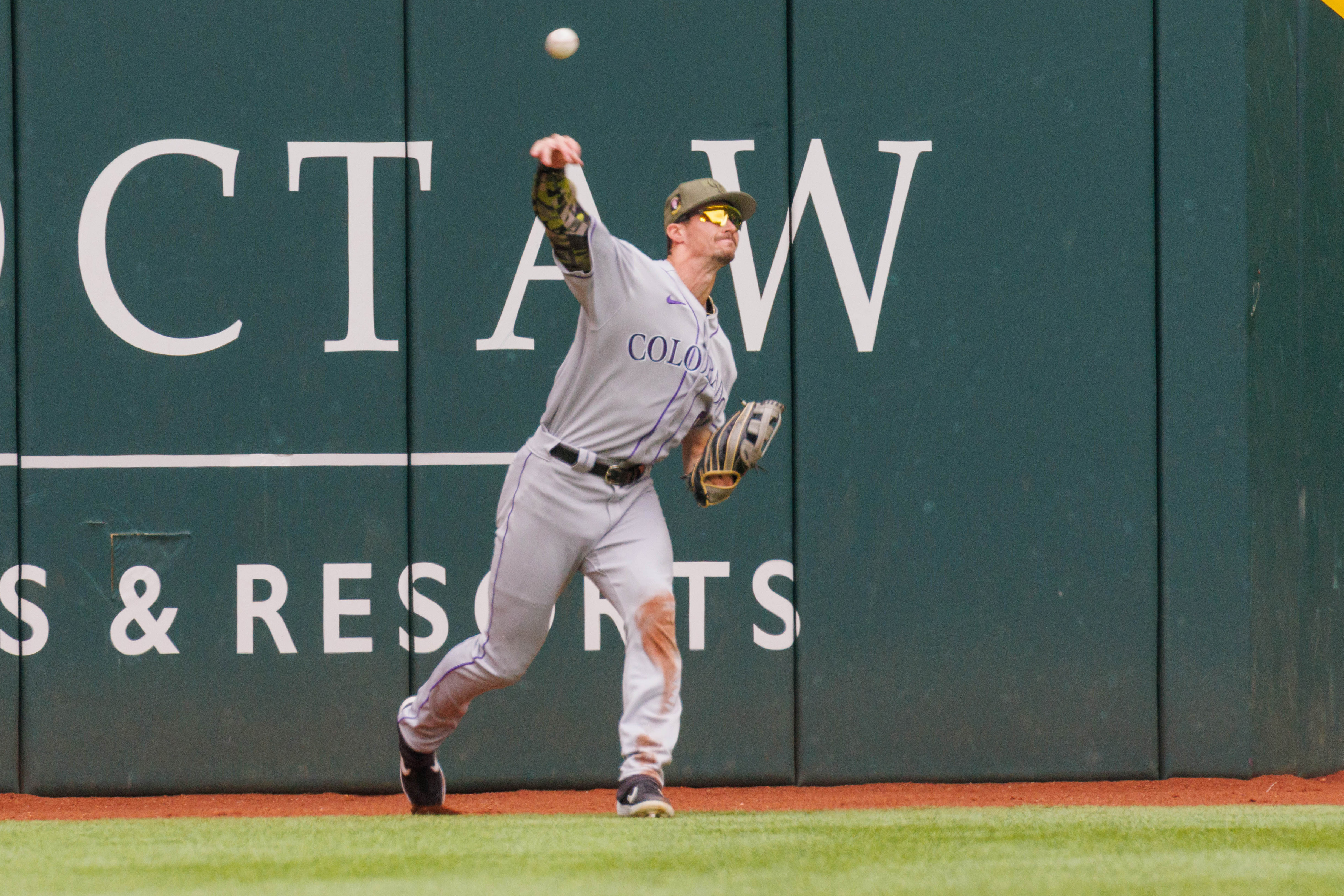 Rangers flex muscles in 13-3 rout to sweep Rockies