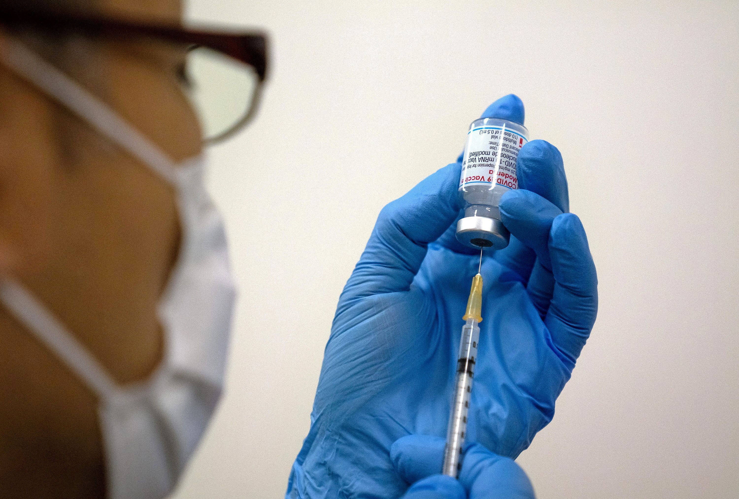 Medical staff prepare Moderna coronavirus (COVID-19) vaccine  in Tokyo