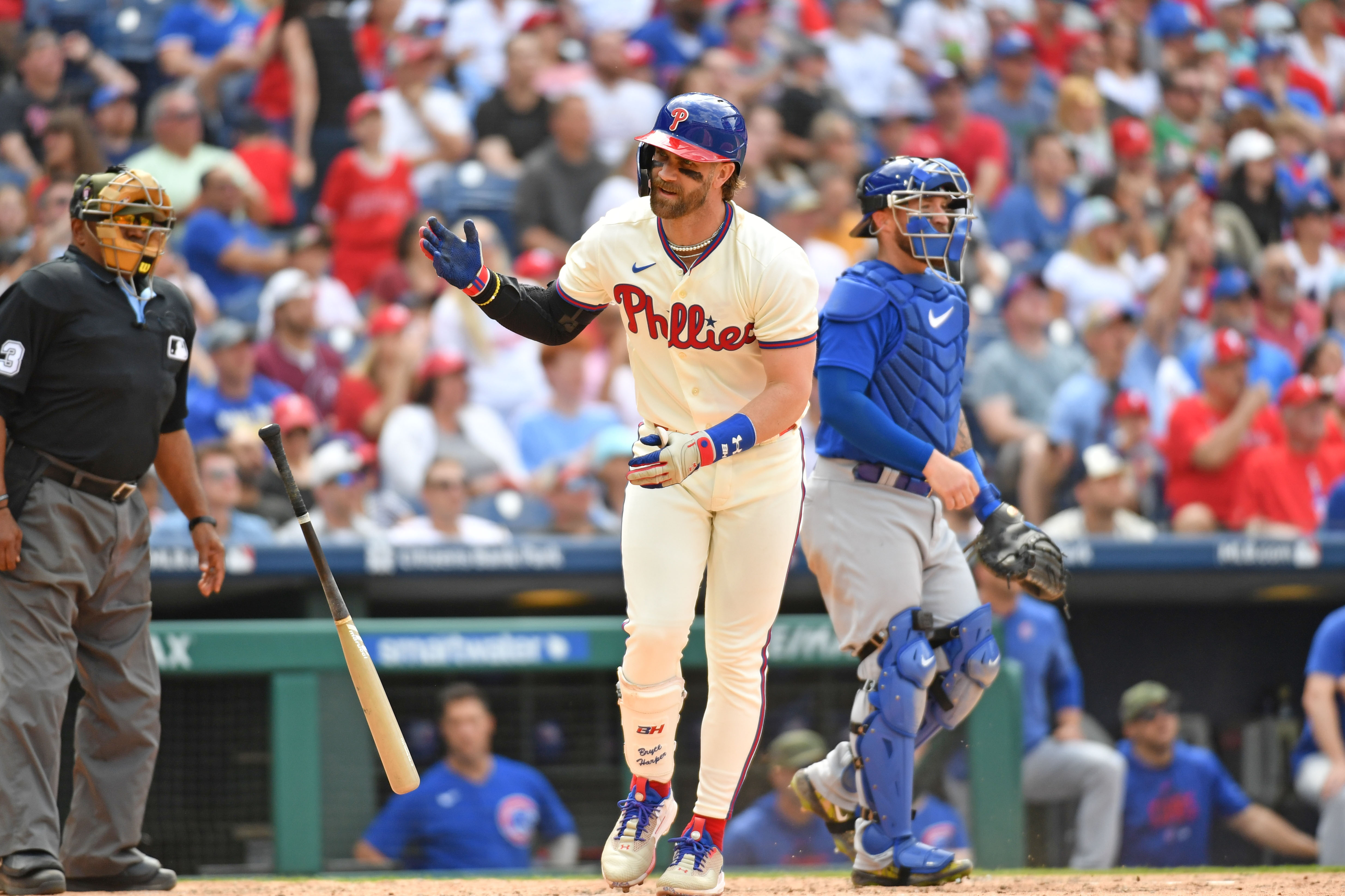 Phillies 'relieved' Bryson Stott OK after taking pitch to elbow; tight back  keeps Bryce Harper at DH