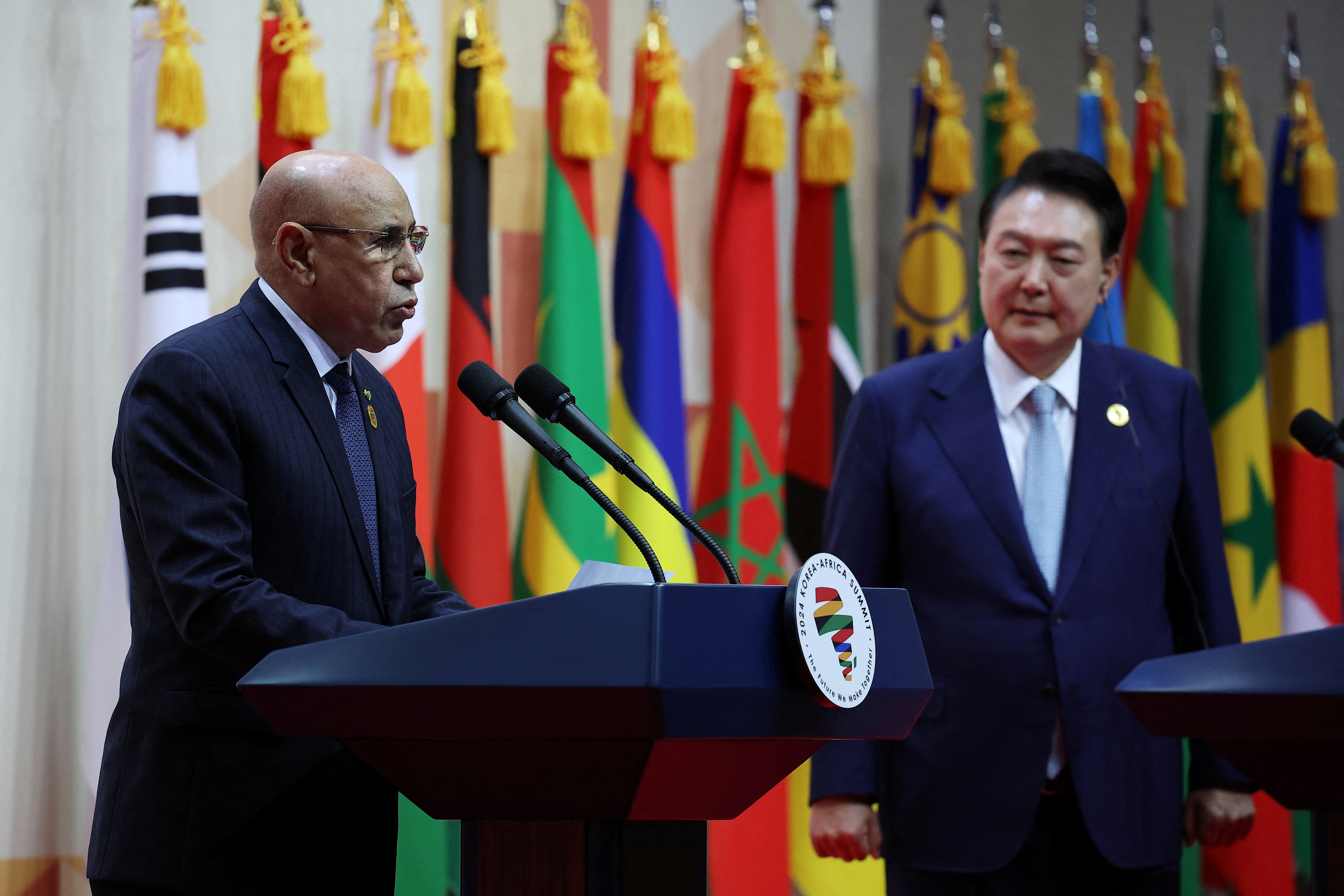 Mauritanian President Mohamed Ould Cheikh El Ghazouani speaks as South Korean President Yoon Suk Yeol looks on during a joint news conference during 2024 Korea-Africa Summit in Goyang