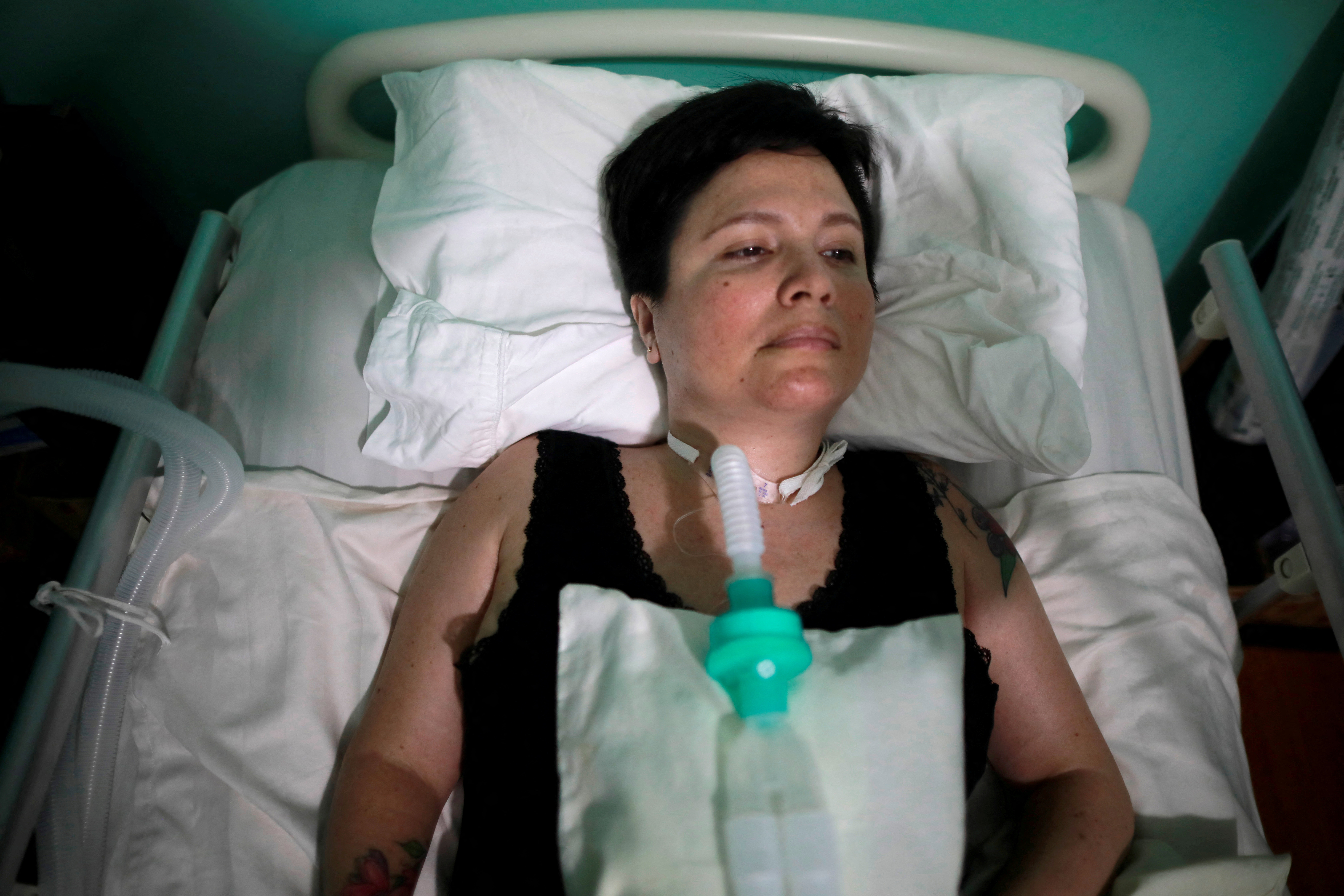 Ana Estrada, a euthanasia advocate who suffers from an incurable condition, lies in bed at her home in Lima
