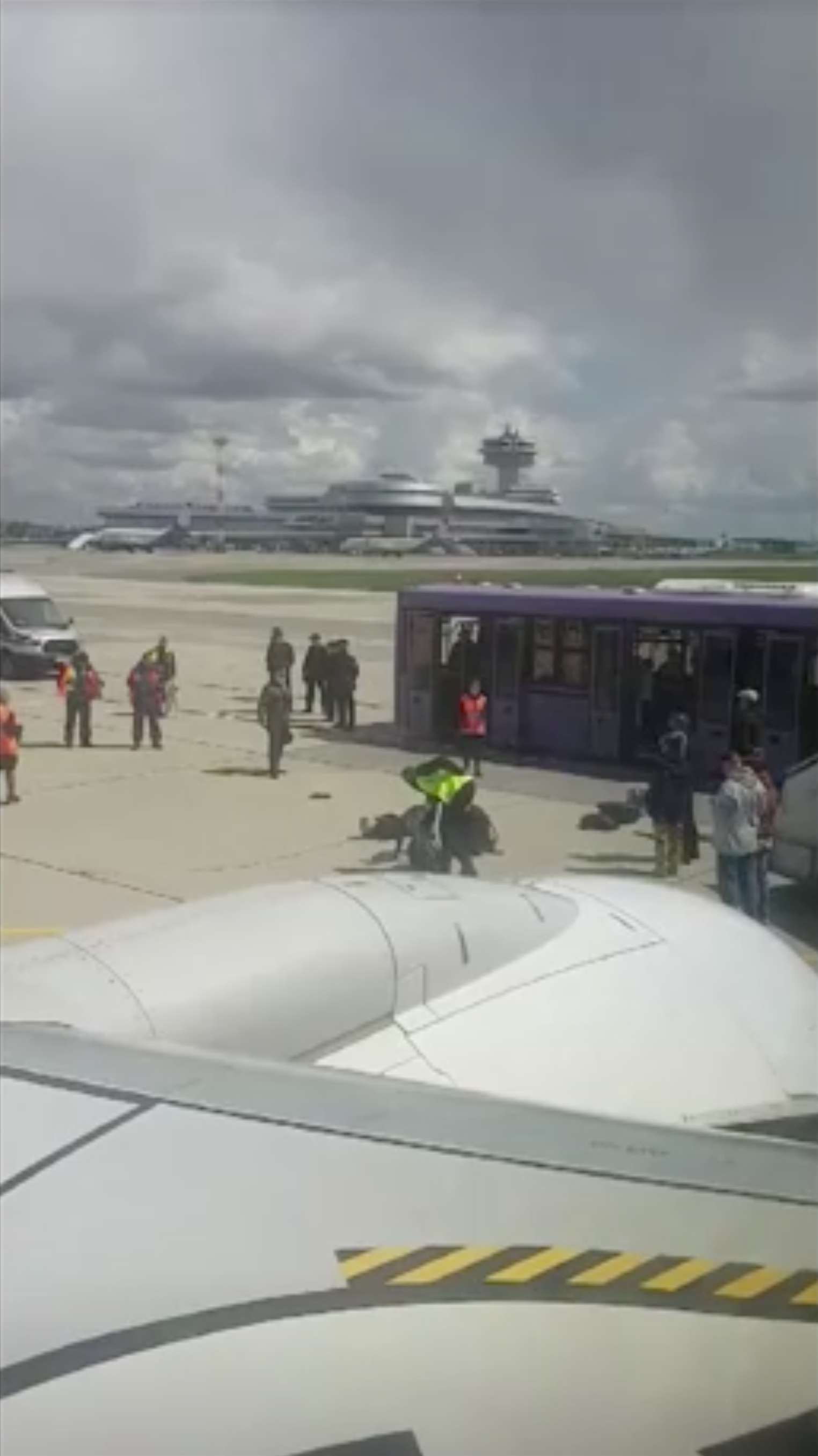 Minsk authorities search luggage of passengers of Ryanair flight which was forced to land in Minsk, Belarus on May 23, 2021 in this still image taken from video
