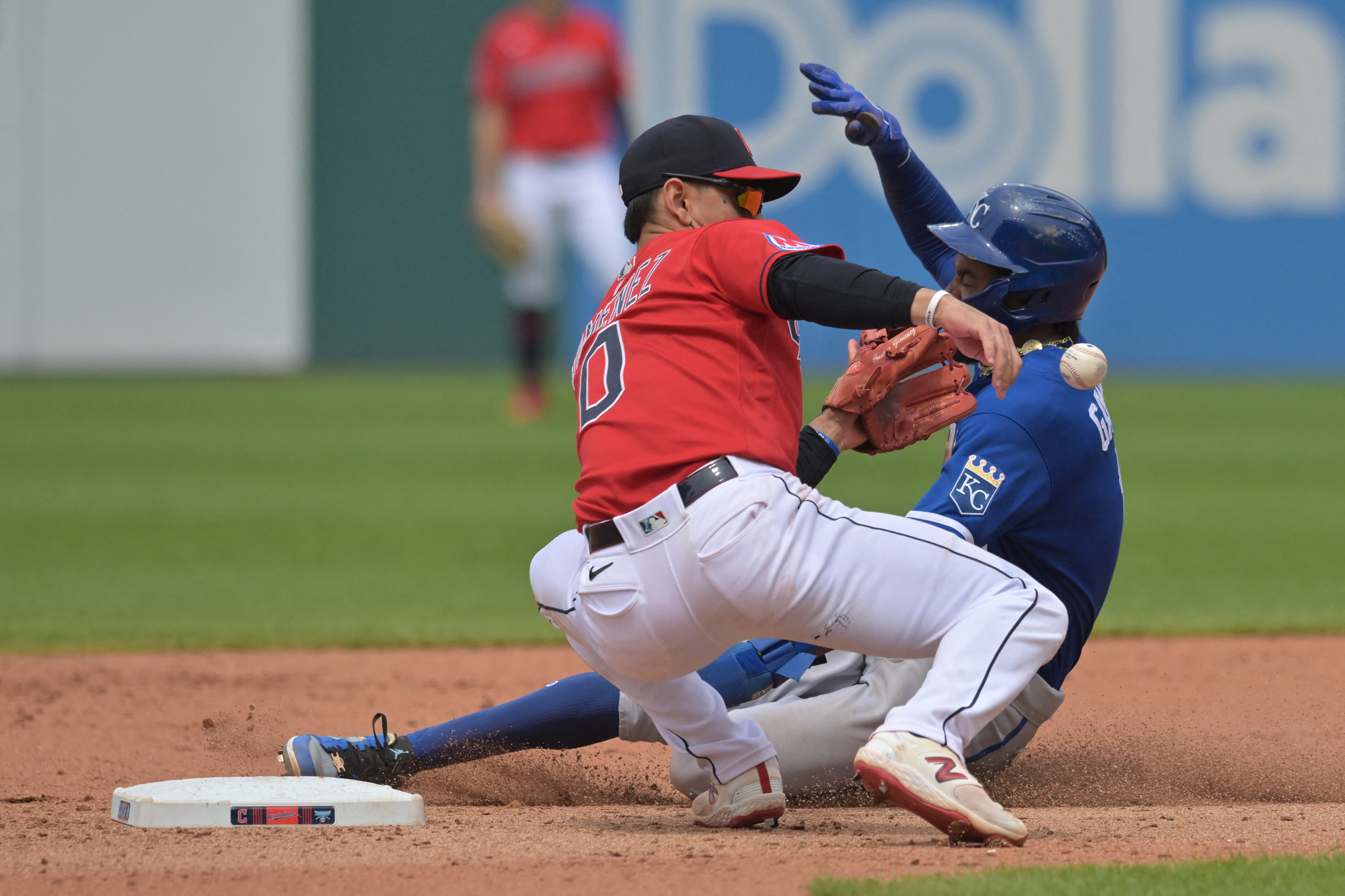 Photo: Royals Kyle Isbel Dives Toward Home Plate on Opening Day