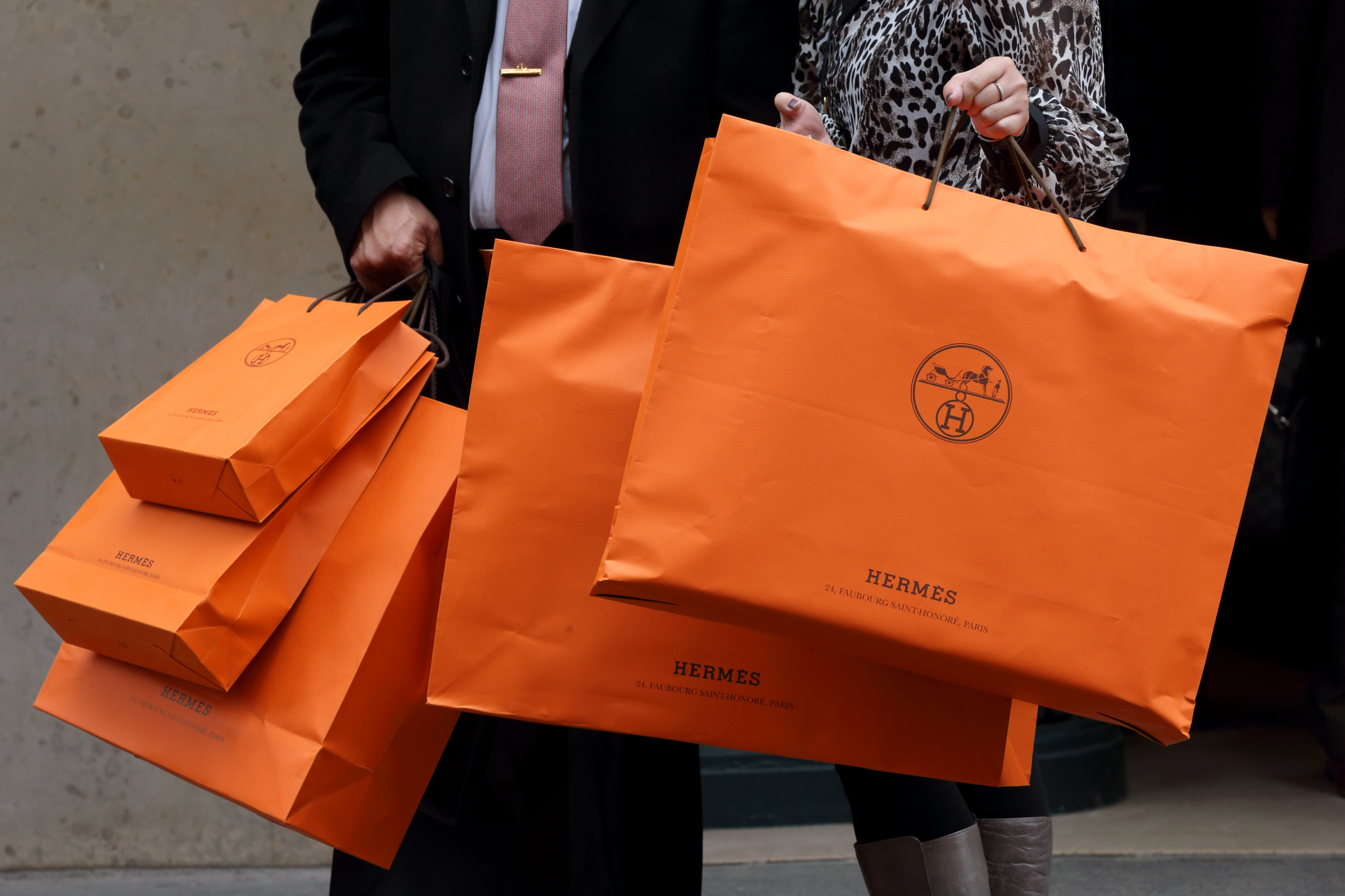 Affluent splash out on pricey Birkin bags but clouds loom | Reuters