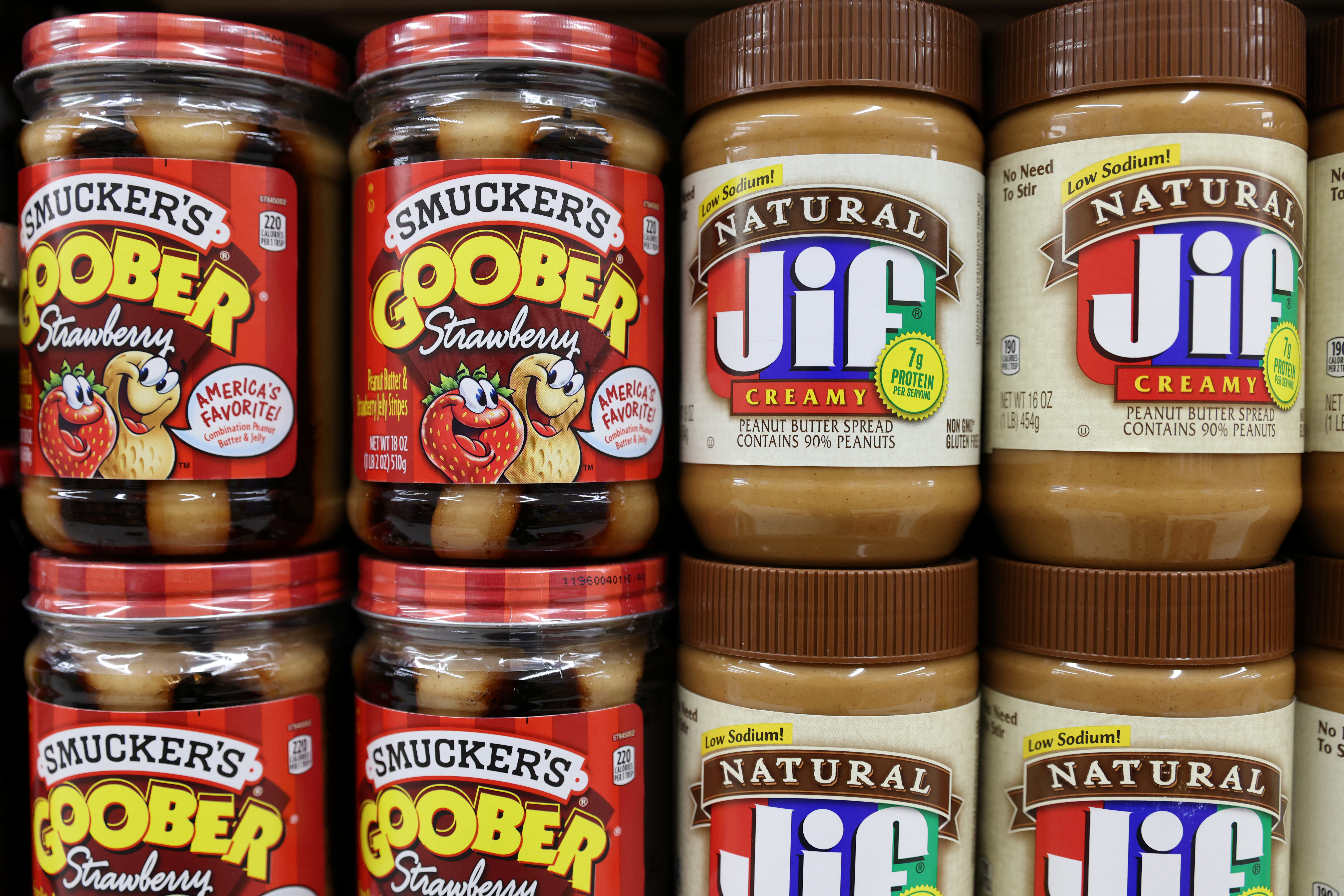 Smucker's Goober Strawberry and Jif peanut butter, brands owned by The J.M. Smucker Company, are seen for sale in a store in Manhattan, New York City