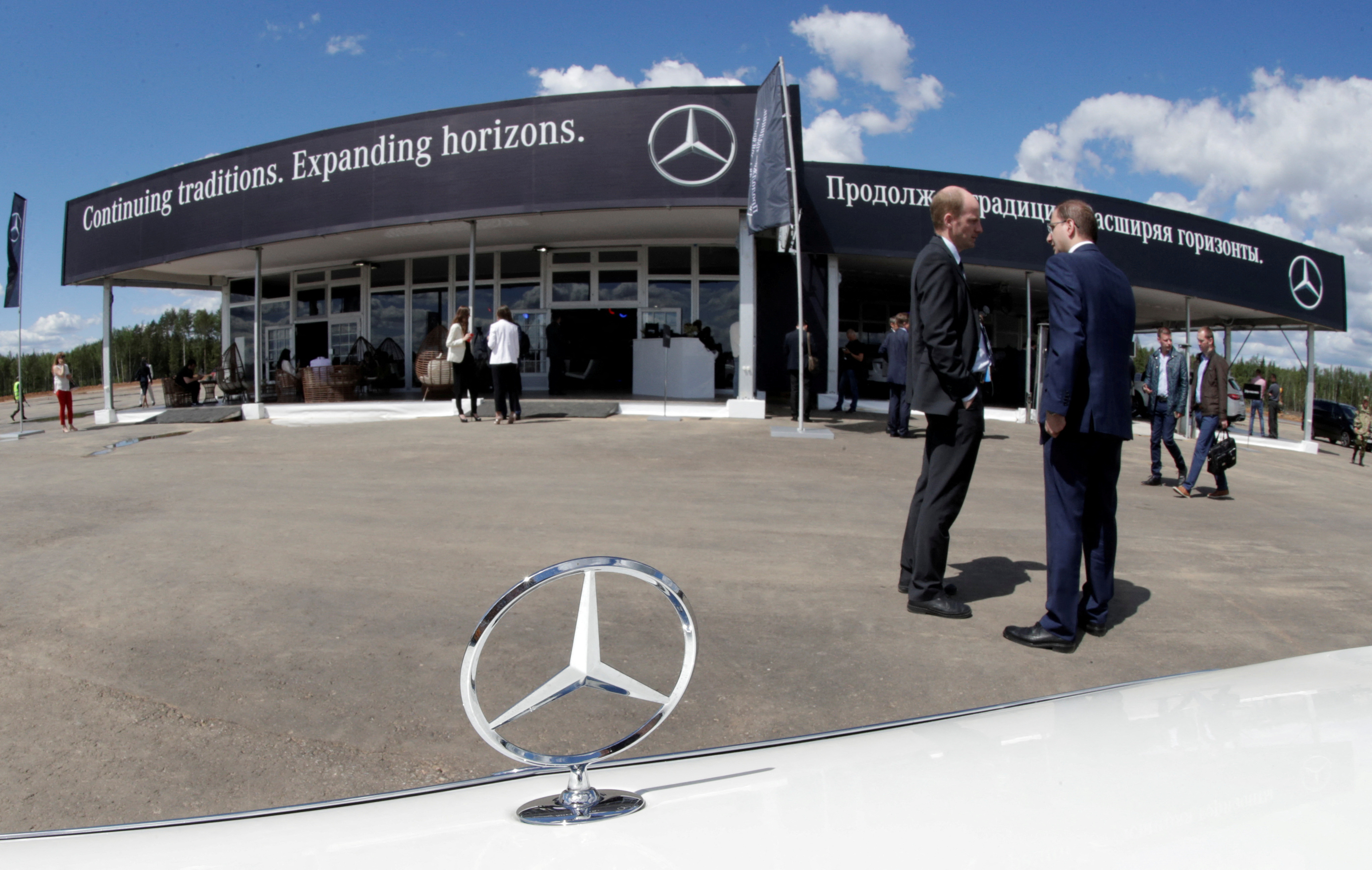 The Mercedes-Benz logo is seen on a car at a new Mercedes-Benz plant's cornerstone laying ceremony in Esipovo