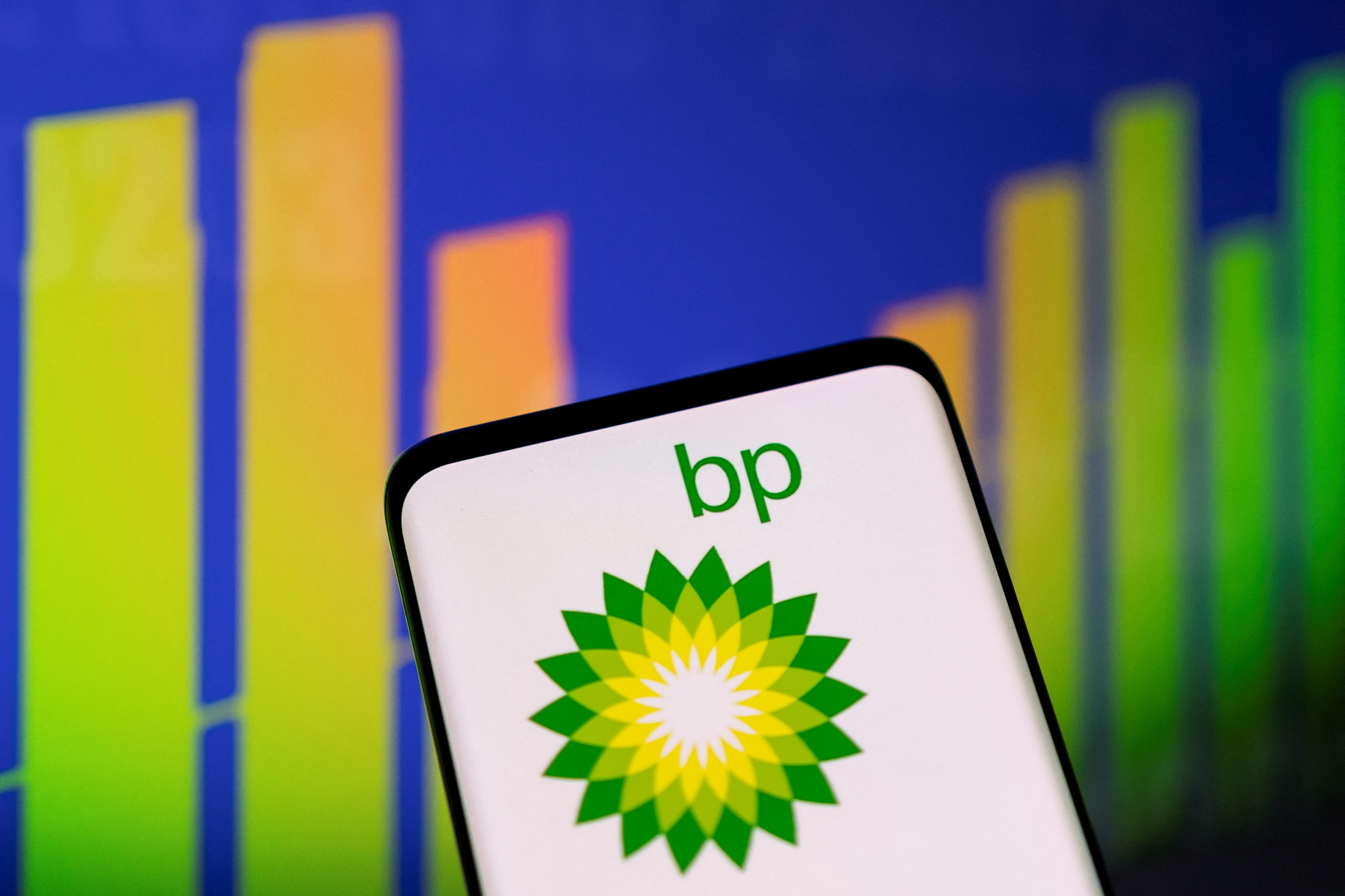 Illustration shows BP logo and stock graph
