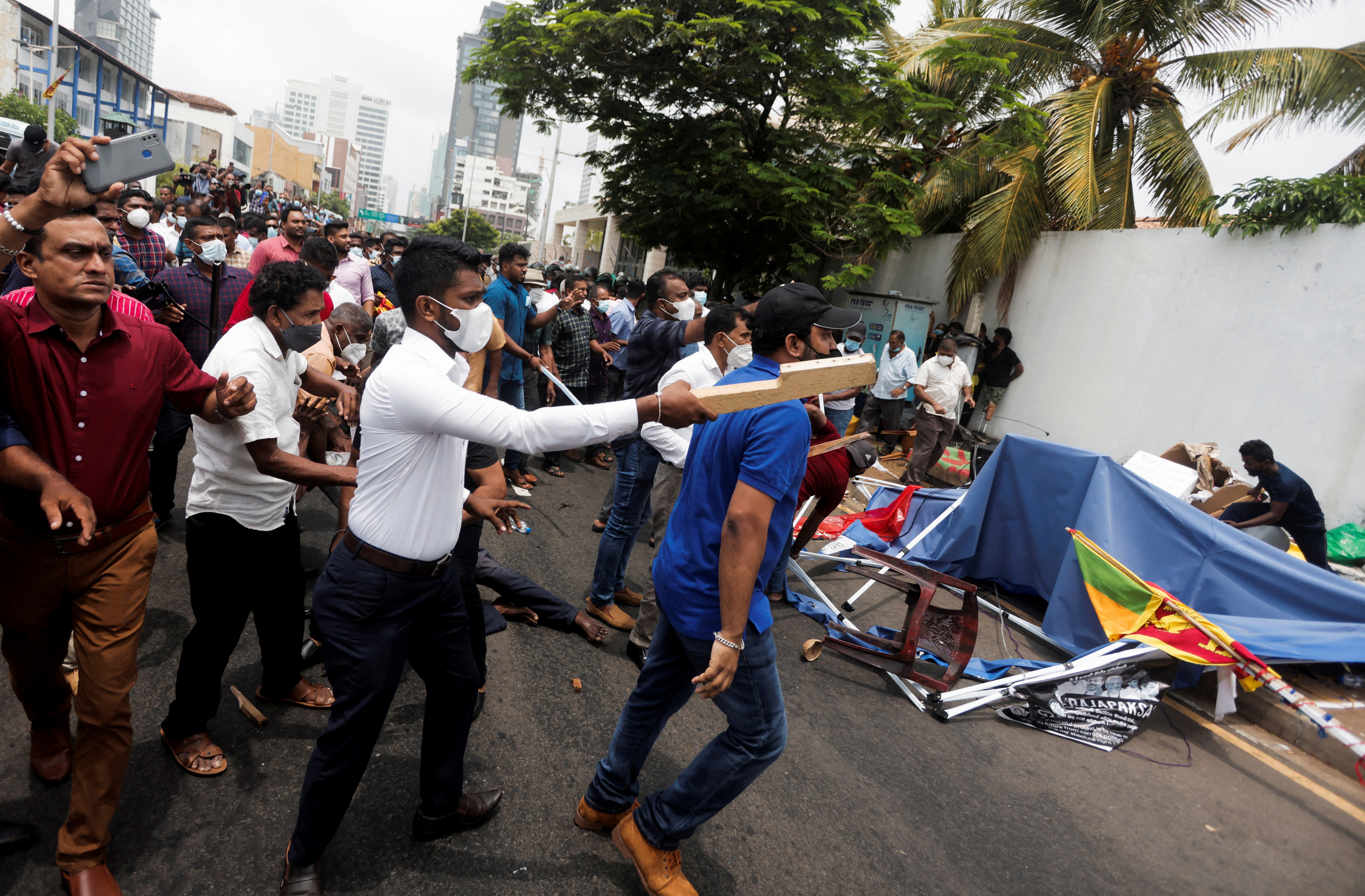 Sri Lanka's ruling party supporters storm anti-government protest camp, at least 9 injured, in Colombo