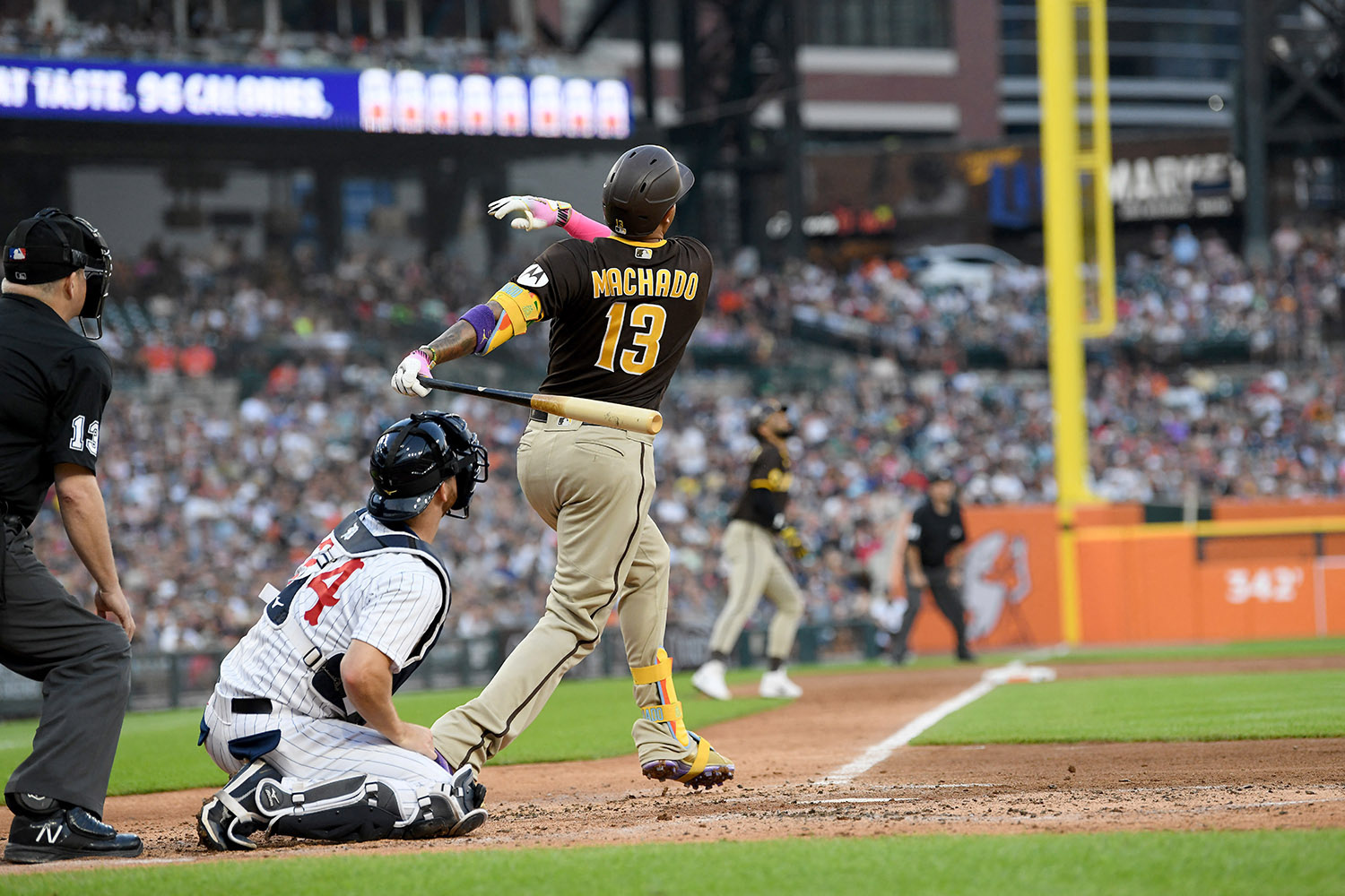 Download Fernando Tatis Jr. delivering a home run swing Wallpaper