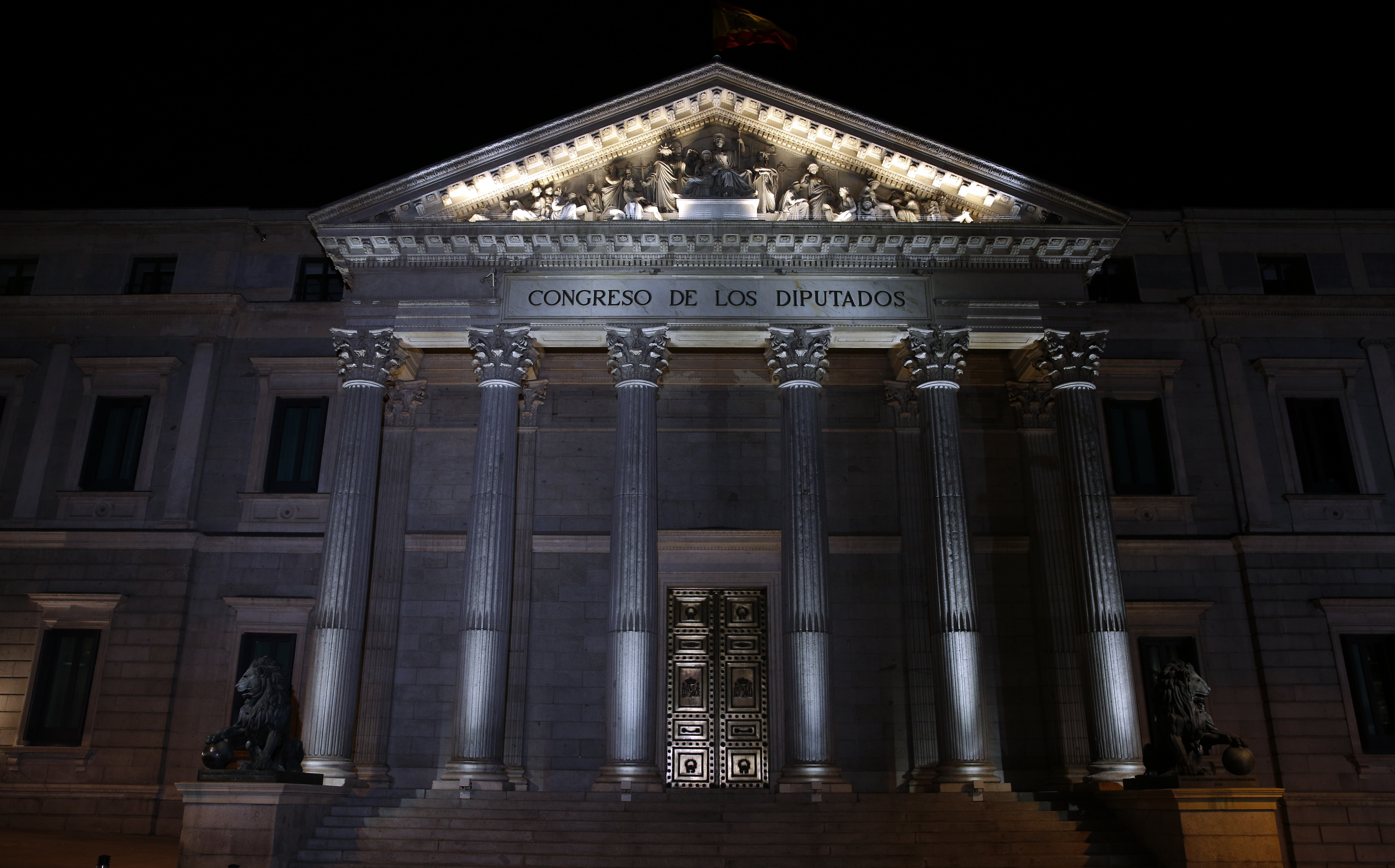 The Spanish Parliament building is seen at night in central Madrid