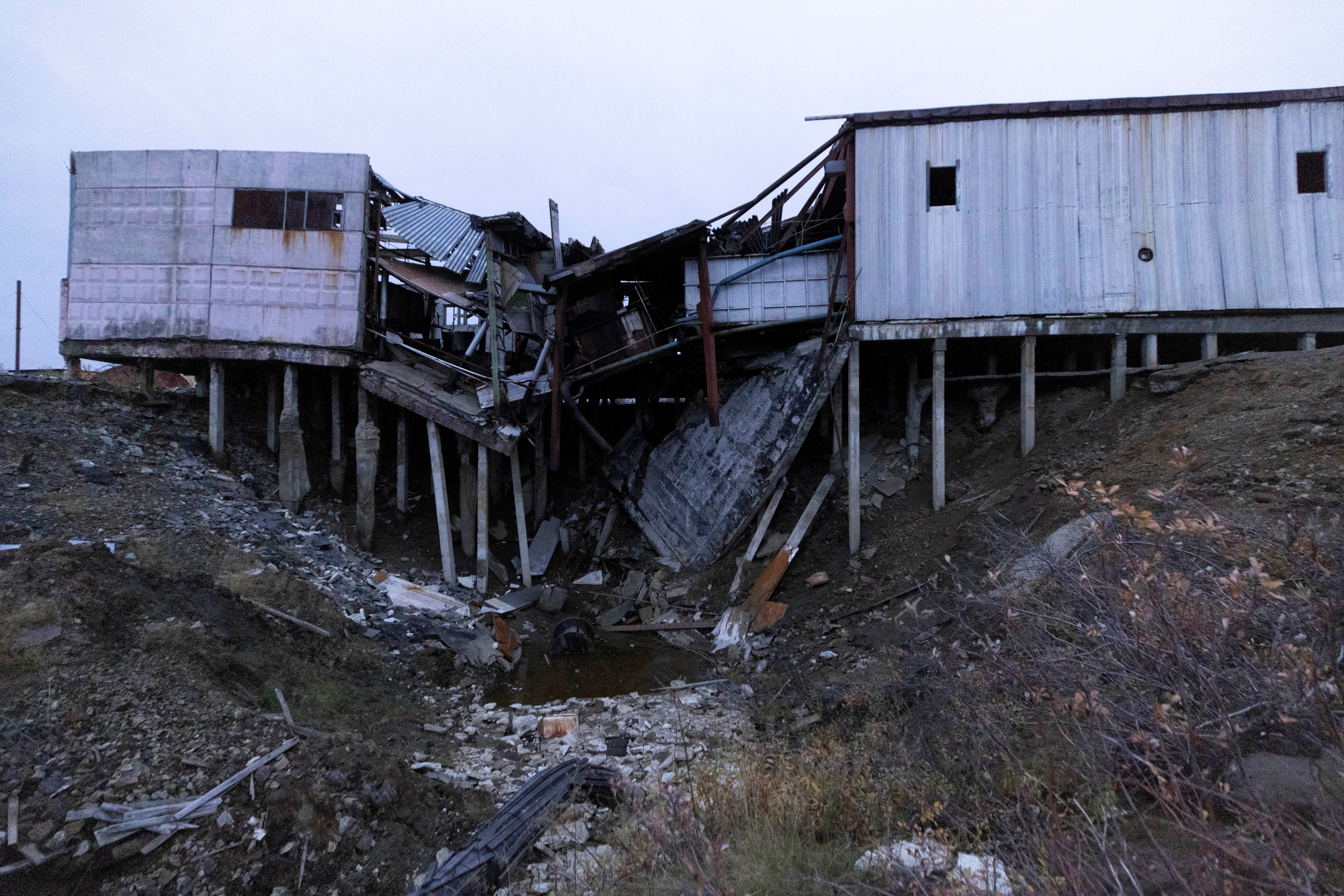 An industrial building that was destroyed when the permafrost thawed under its foundation is seen in the town of Chersky