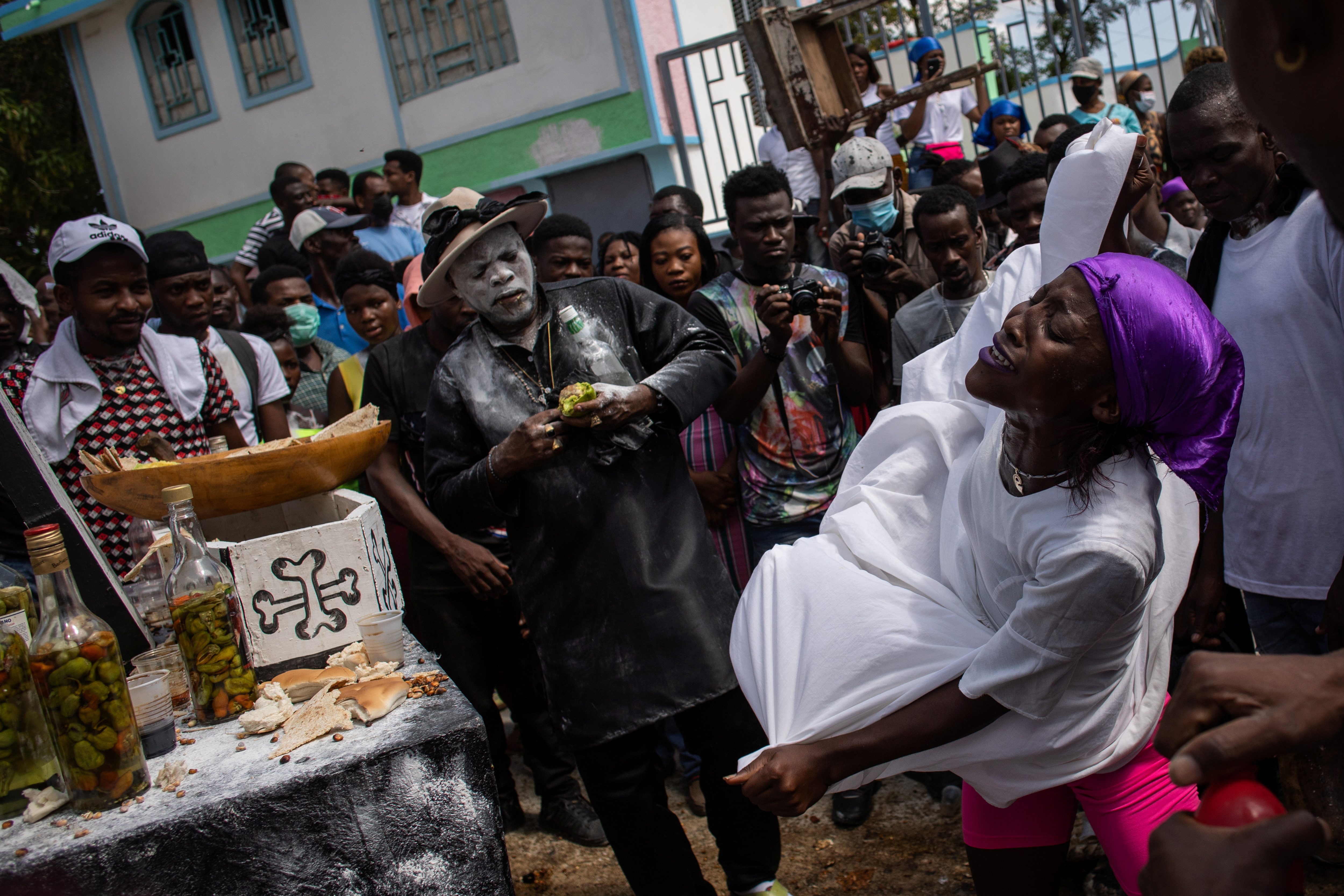 Voodoo followers, called Pitit Fey, attend a ceremony during the Day of the Dead celebrations at the Meyotte cemetery in Kay Gouye, in Port-au-Prince, Haiti, November 1, 2021. REUTERS/Claudia Daut