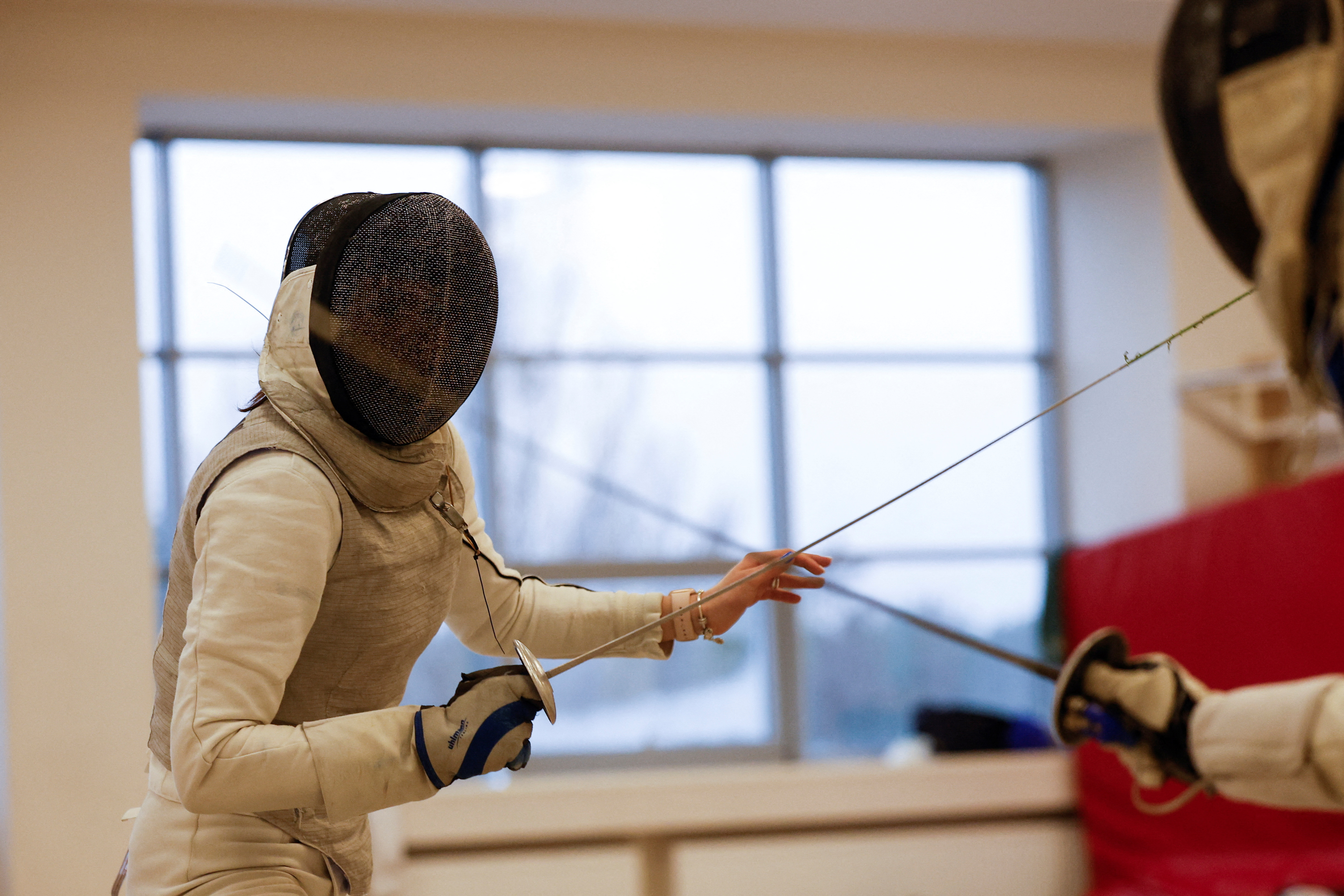 Member of Ukraine's fencing team Poloziuk attends a training session at the Olympic training base in Kyiv