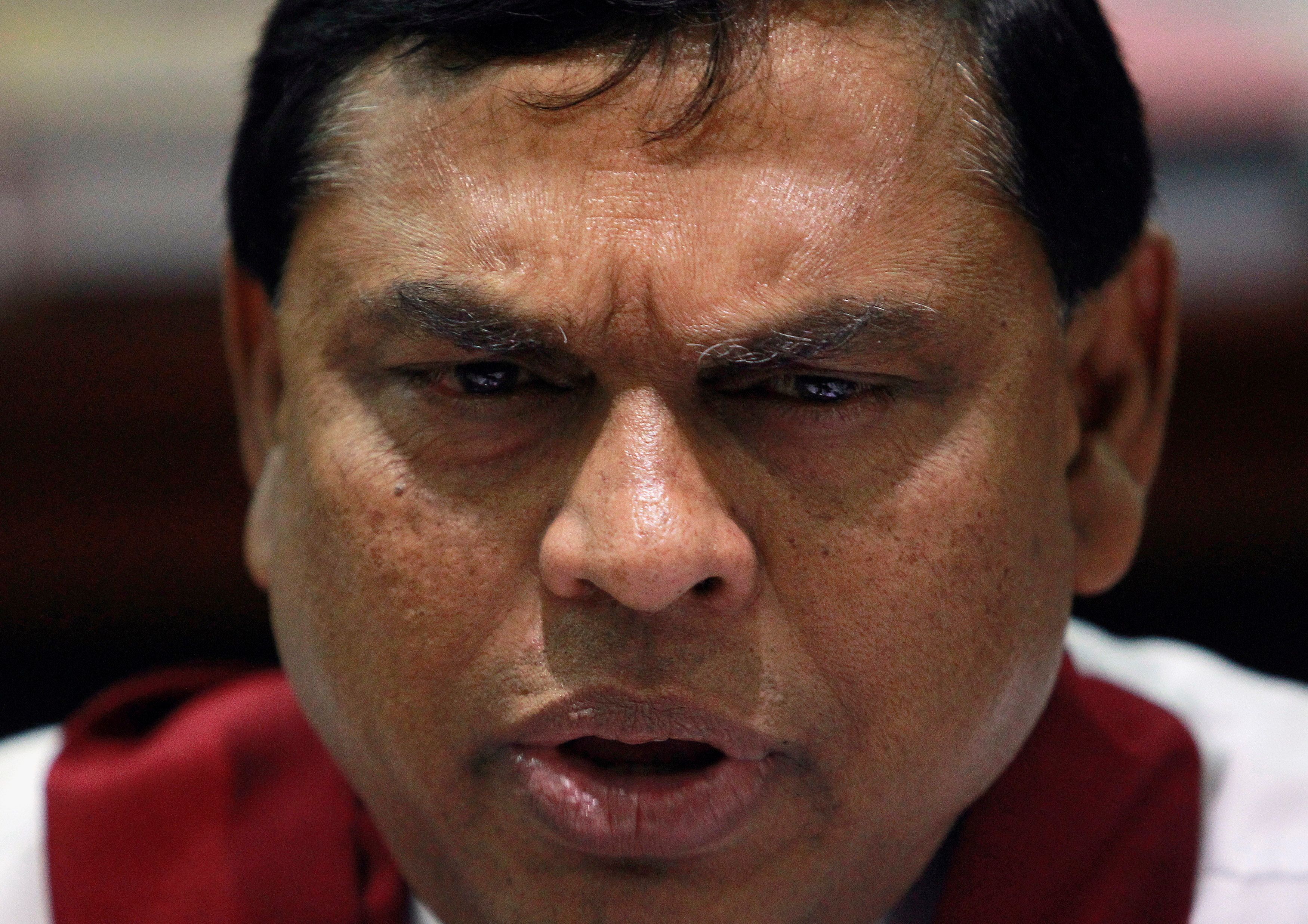 Basil Rajapaksa, speaks during an interview with Reuters in Colombo April 10, 2012. REUTERS/Dinuka Liyanawatte/File Photo