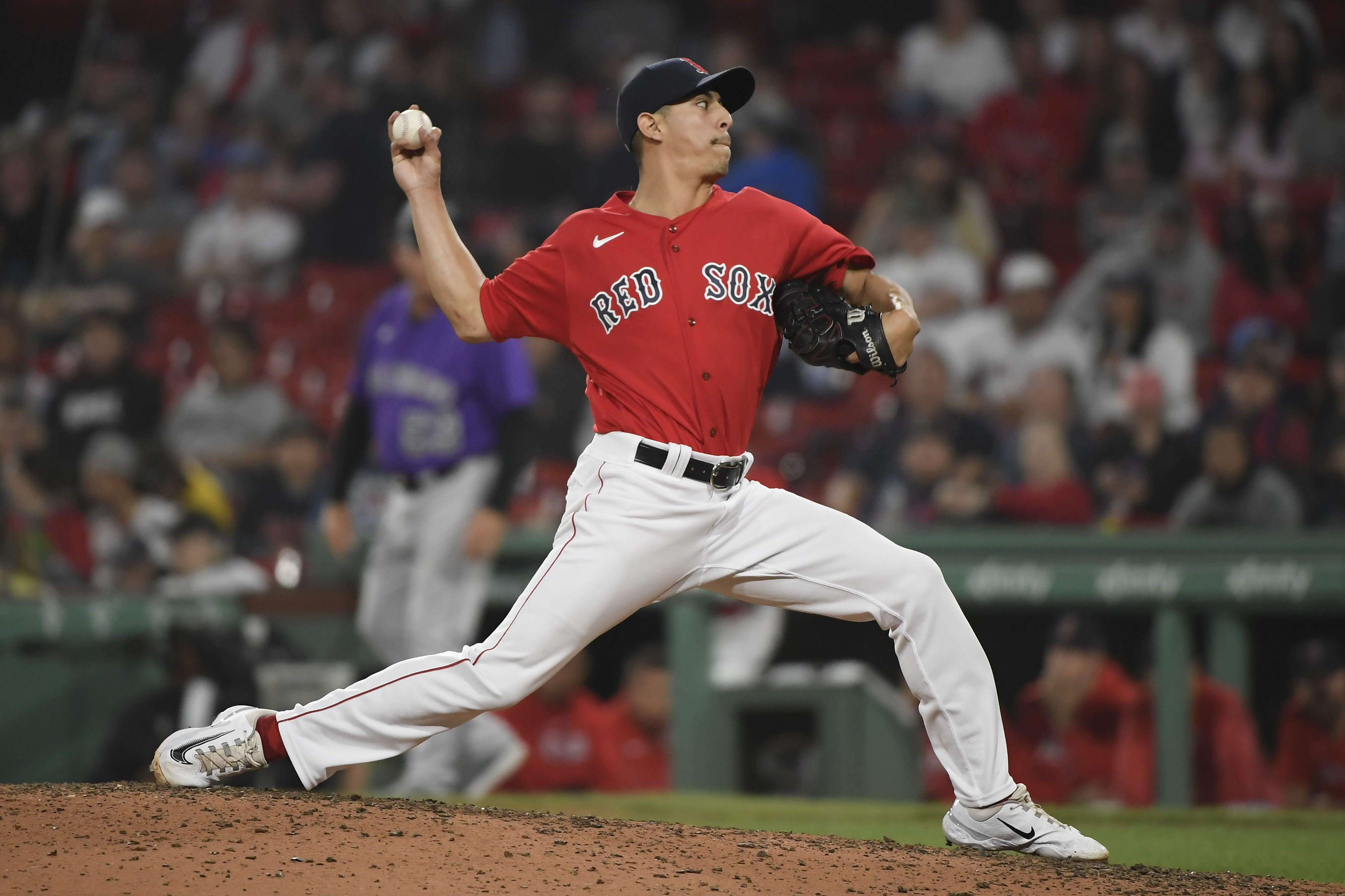 Rockies beat Red Sox, 4-3, in their first extra-inning game of season