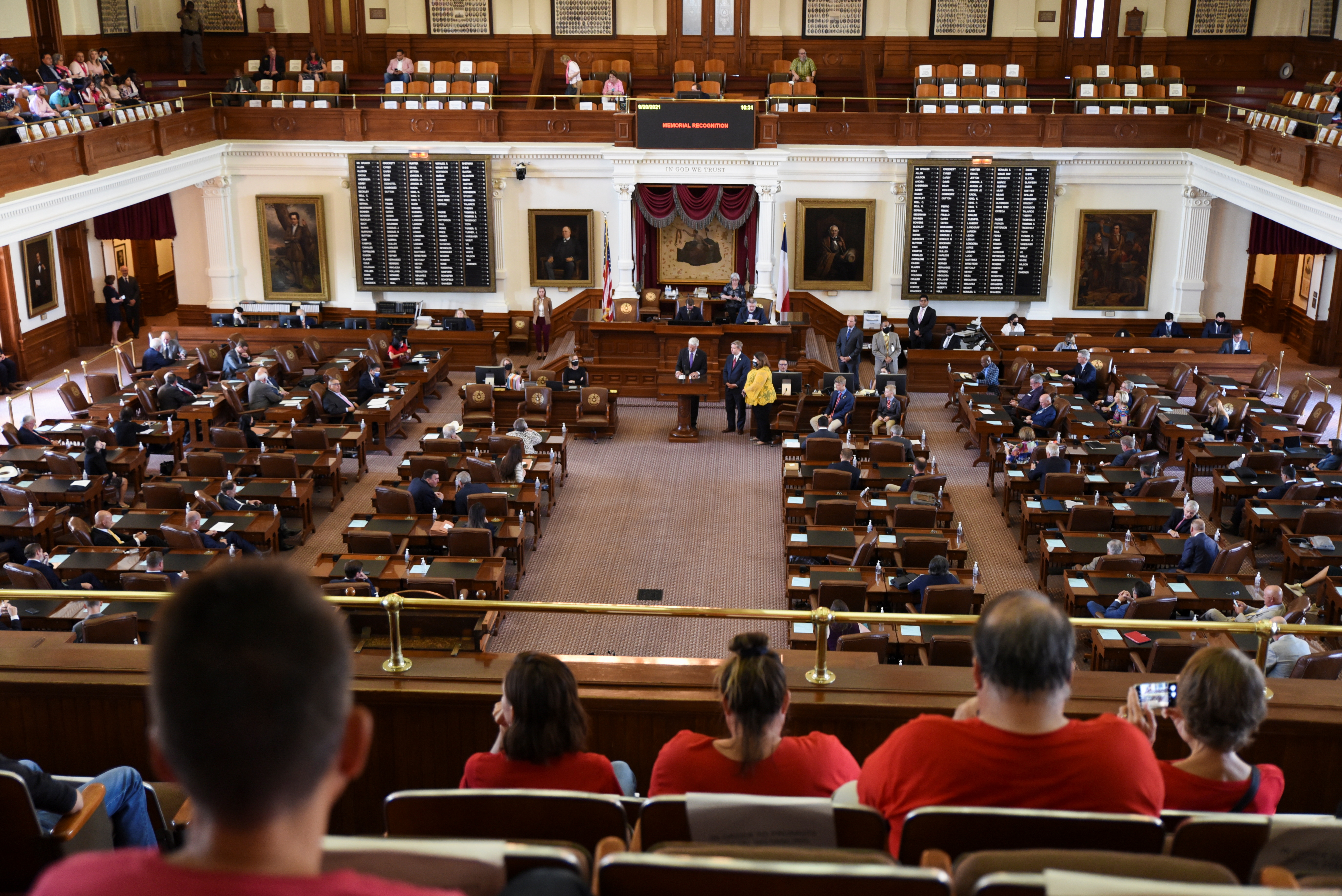 Attendees look on as the Texas House of Representatives convenes a third special legislative session for controversial legislative items at the State Capitol in Austin, Texas, U.S. September 20, 2021.  REUTERS/Sergio Flores