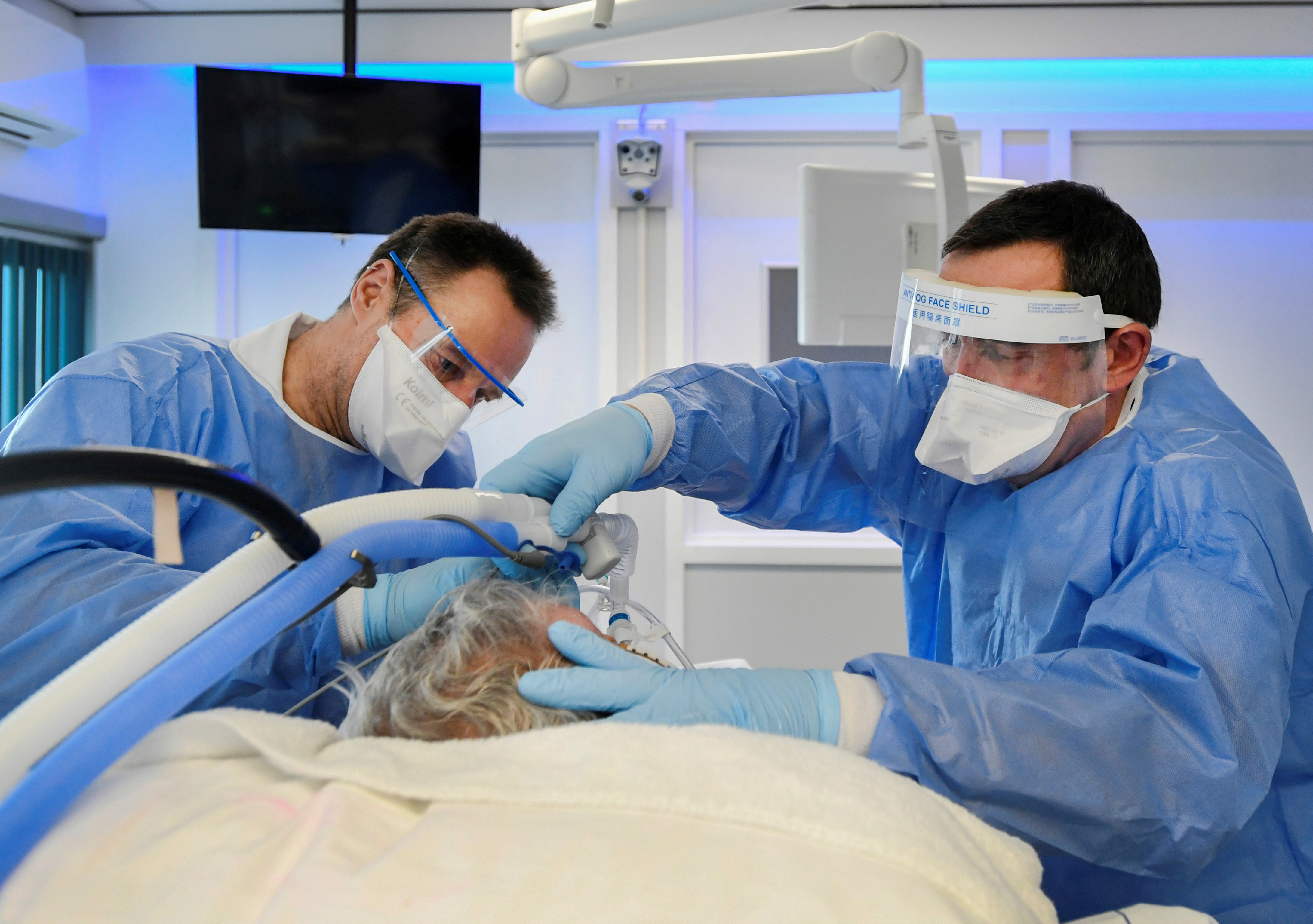 Medics treat a patient infected with COVID-19, in the intensive care unit at Maastricht UMC+ Hospital in Maastricht, Netherlands