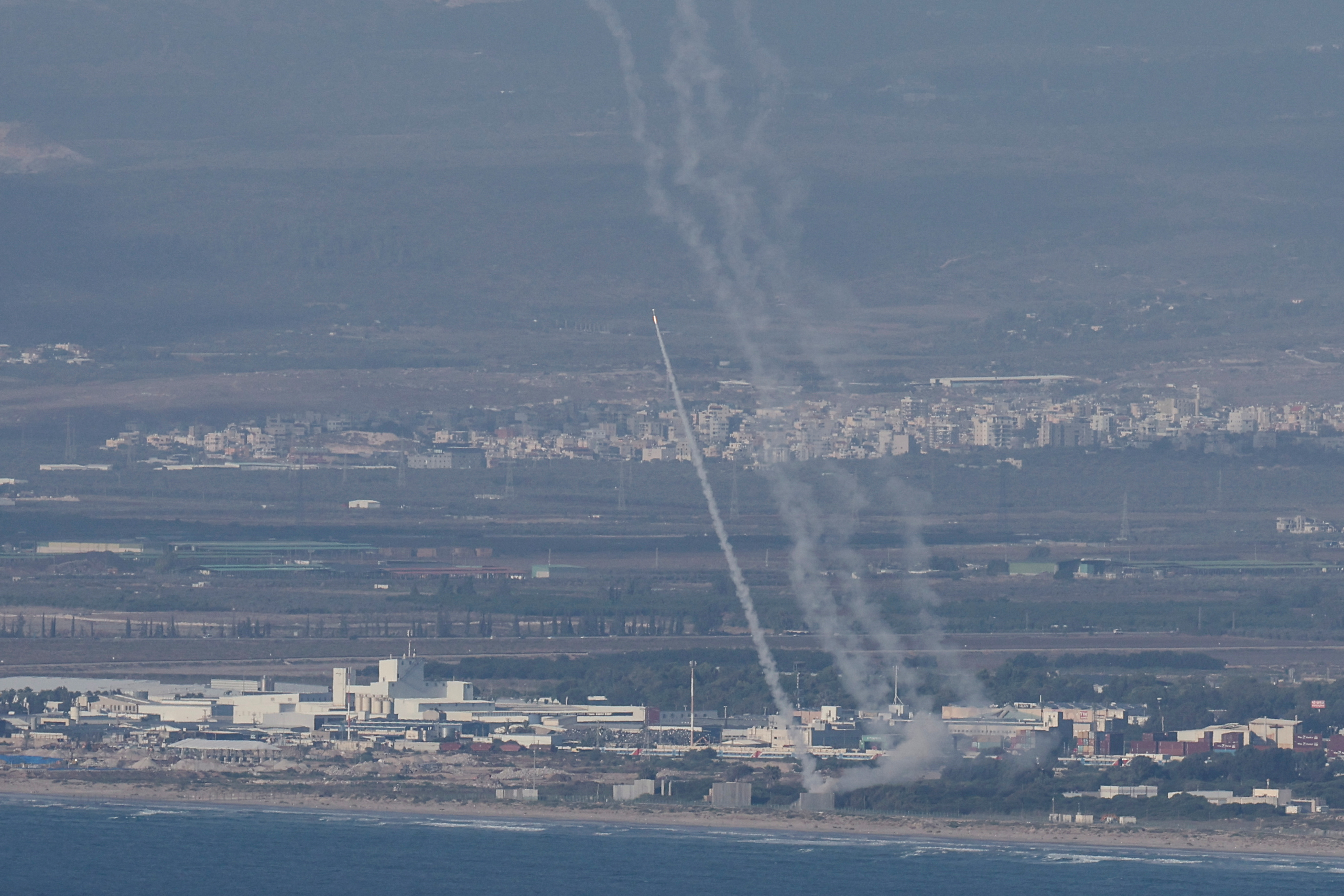 Israel's Iron Dome anti-missile system operates for interceptions as rockets are launched from Lebanon towards Israel, as seen from Haifa